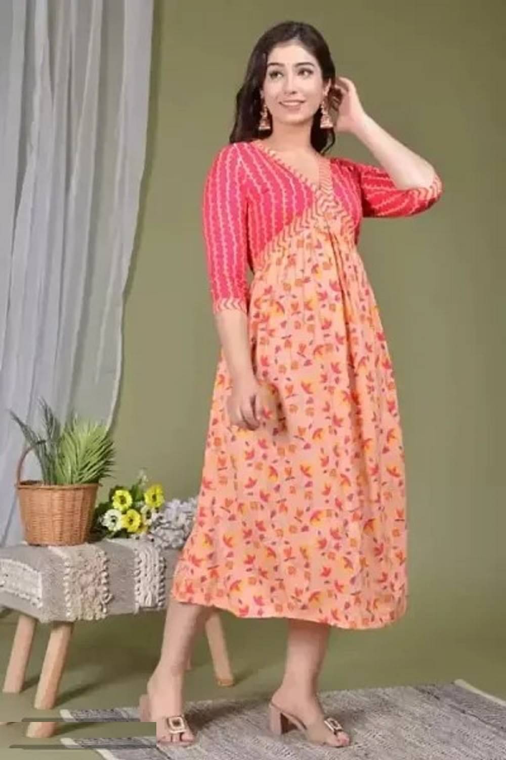 Gobya Rayon Printed Flared Women's Kurti - Pink ( Pack of 1 ) Gobya Rayon Printed Flared Women's Kurti - Pink ( Pack of 1 )