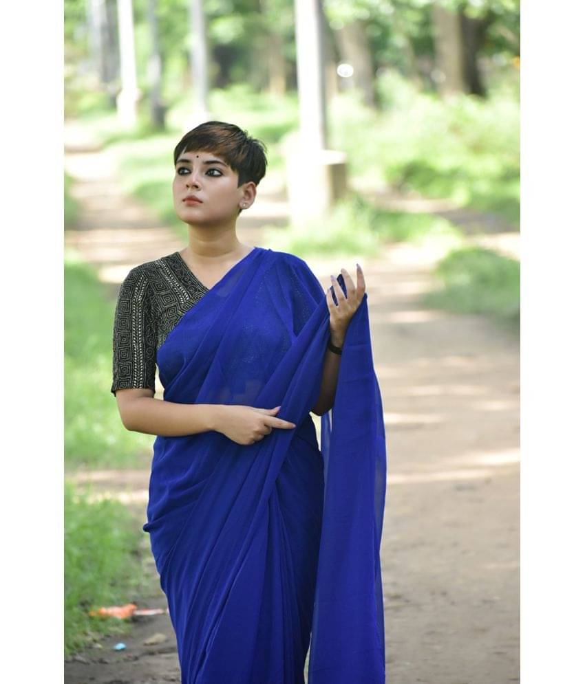 ANAND SAREES Georgette Solid Saree With Unstitched Blouse Piece ( Blue ) ANAND SAREES Georgette Solid Saree With Unstitched Blouse Piece ( Blue )