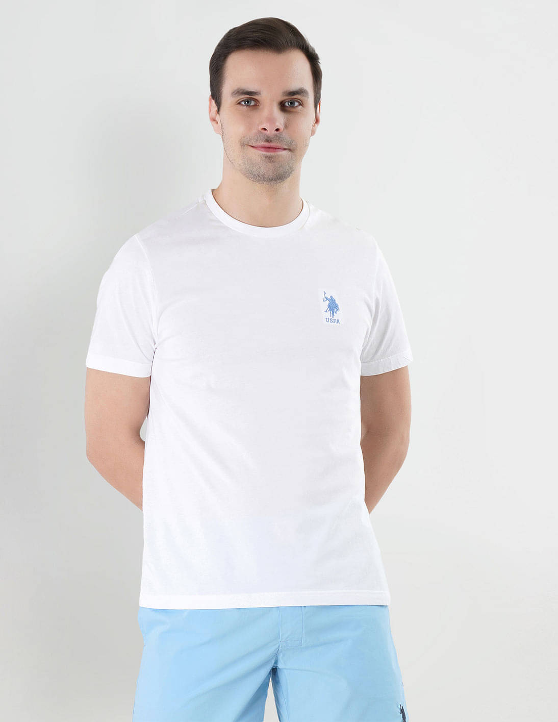 U.S. Polo Assn. Cotton Regular Fit Solid Half Sleeves Men's T-Shirt - White ( Pack of 1 ) U.S. Polo Assn. Cotton Regular Fit Solid Half Sleeves Men's T-Shirt - White ( Pack of 1 )