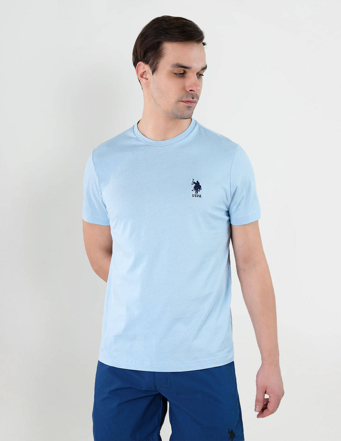 U.S. Polo Assn. Cotton Regular Fit Solid Half Sleeves Men's T-Shirt - Light Blue ( Pack of 1 )     			U.S. Polo Assn. Cotton Regular Fit Solid Half Sleeves Men's T-Shirt - Light Blue ( Pack of 1 )