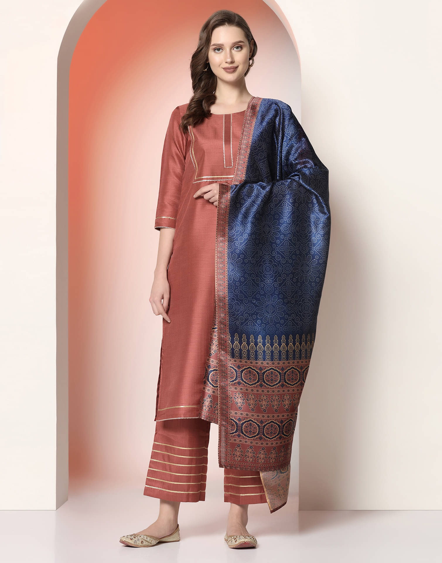 Skylee Silk Solid Kurti With Pants Women's Stitched Salwar Suit - Rust ( Pack of 1 ) Skylee Silk Solid Kurti With Pants Women's Stitched Salwar Suit - Rust ( Pack of 1 )