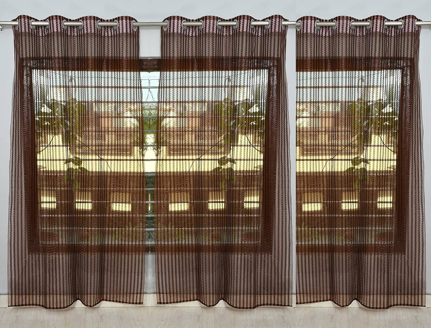     			BELLA TRUE Solid Transparent Eyelet Curtain 5 ft ( Pack of 3 )  Brown
