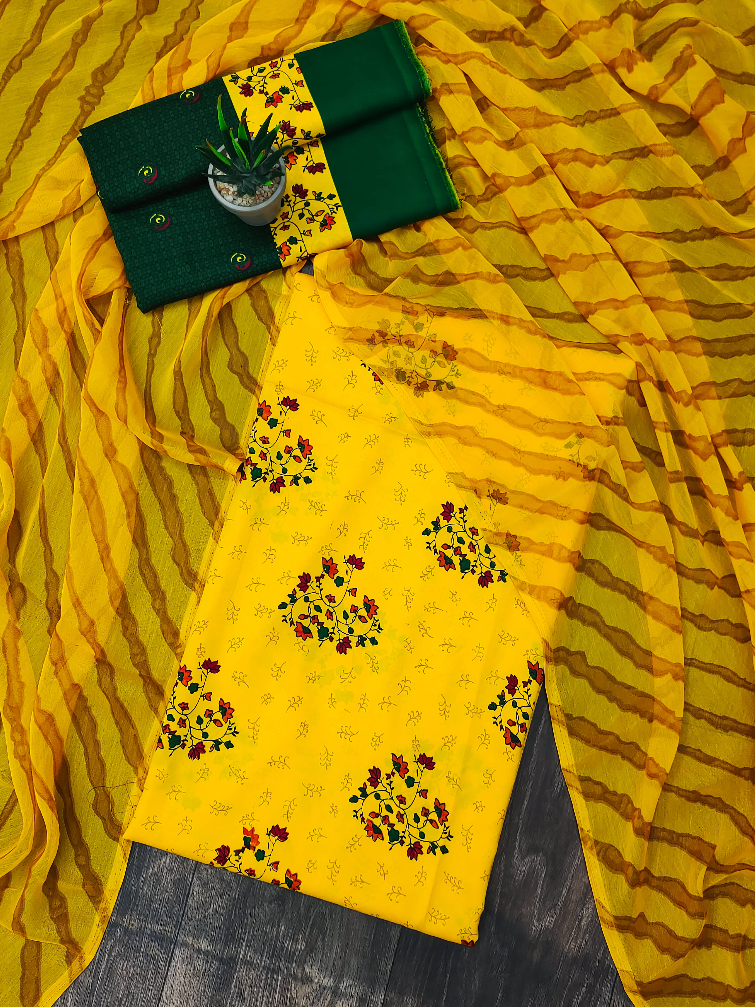 Anand Unstitched Crepe Printed Dress Material - Yellow ( Pack of 1 )     			Anand Unstitched Crepe Printed Dress Material - Yellow ( Pack of 1 )