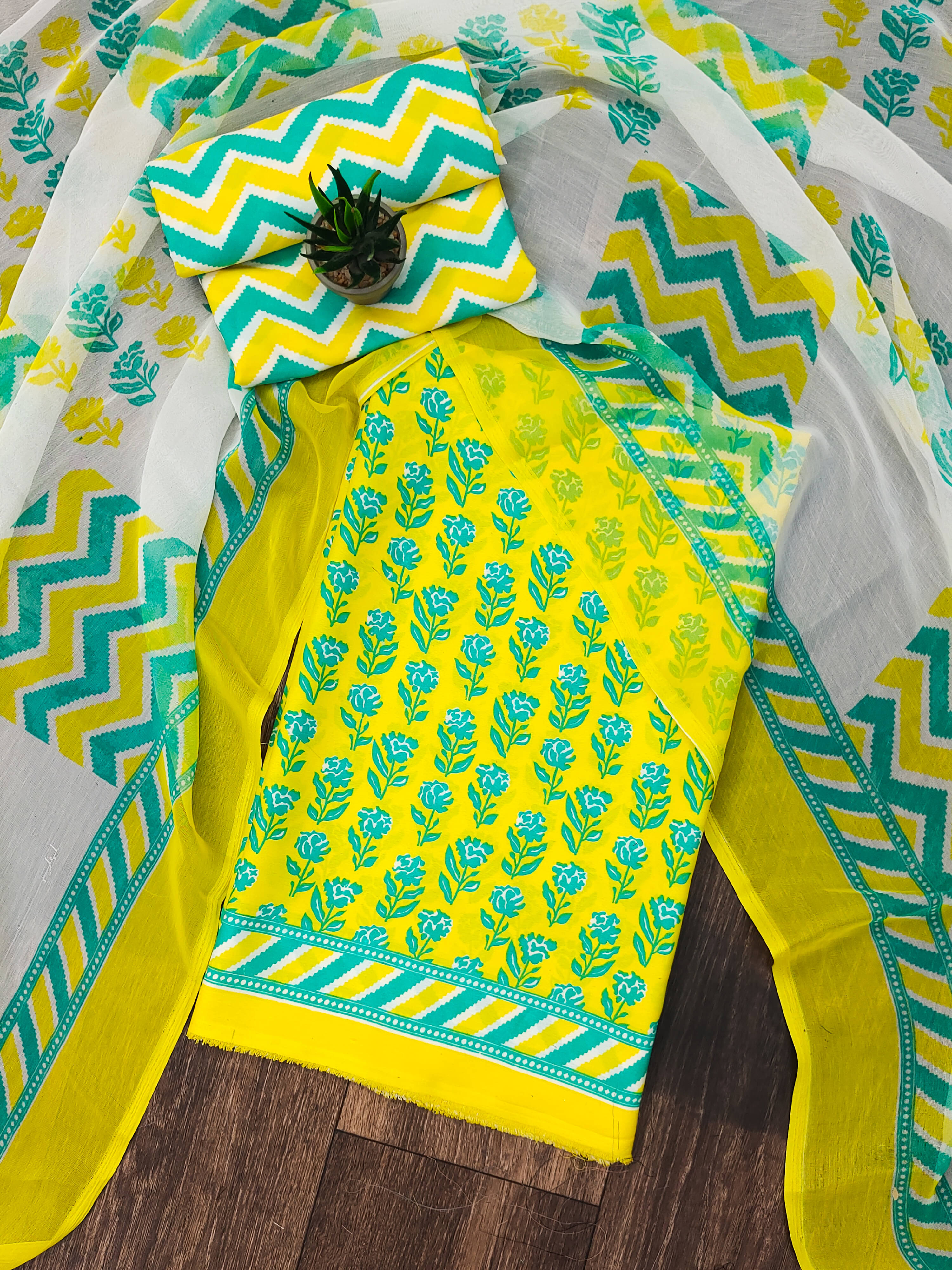 Anand Unstitched Crepe Printed Dress Material - Yellow ( Pack of 1 )     			Anand Unstitched Crepe Printed Dress Material - Yellow ( Pack of 1 )