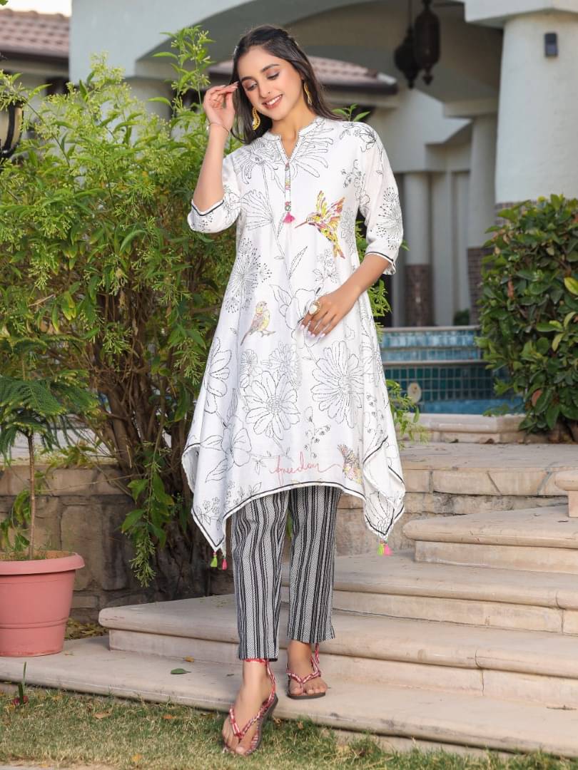 Juniper Nylon Printed Kurti With Pants Women's Stitched Salwar Suit - White ( Pack of 1 )     			Juniper Nylon Printed Kurti With Pants Women's Stitched Salwar Suit - White ( Pack of 1 )