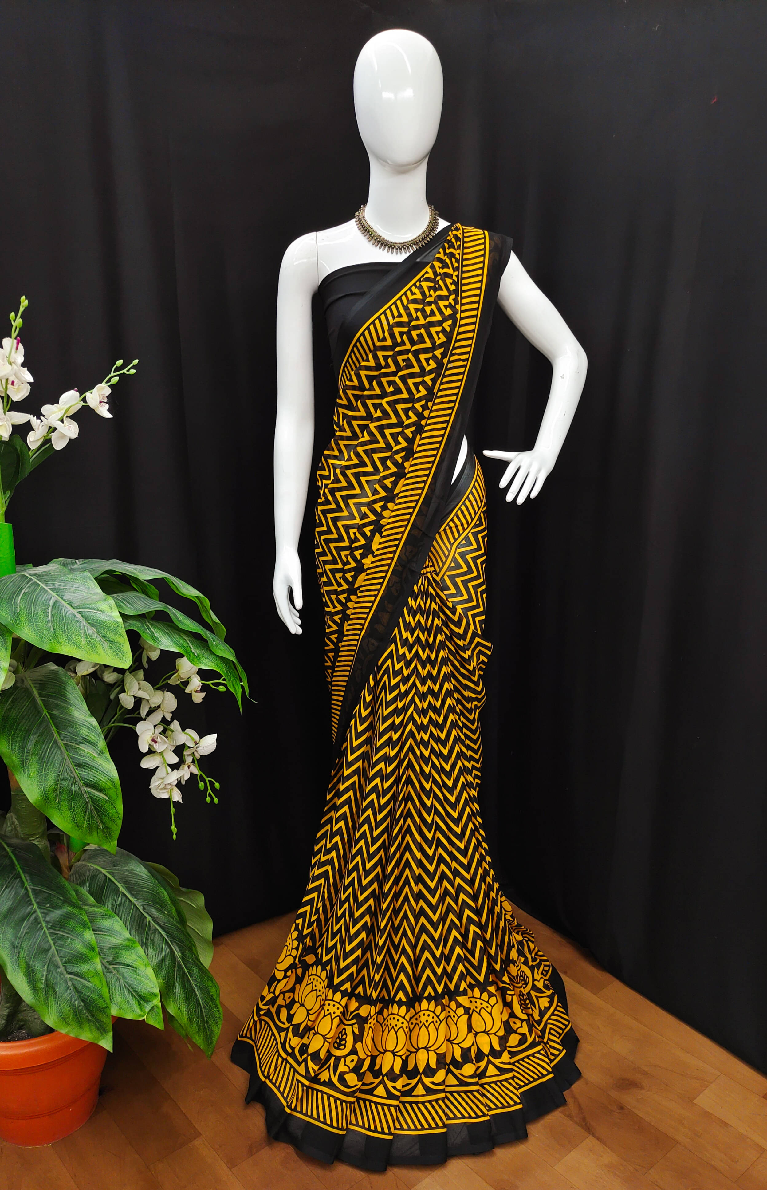 ANAND SAREES Georgette Printed Saree With Unstitched Blouse Piece ( Yellow ) ANAND SAREES Georgette Printed Saree With Unstitched Blouse Piece ( Yellow )