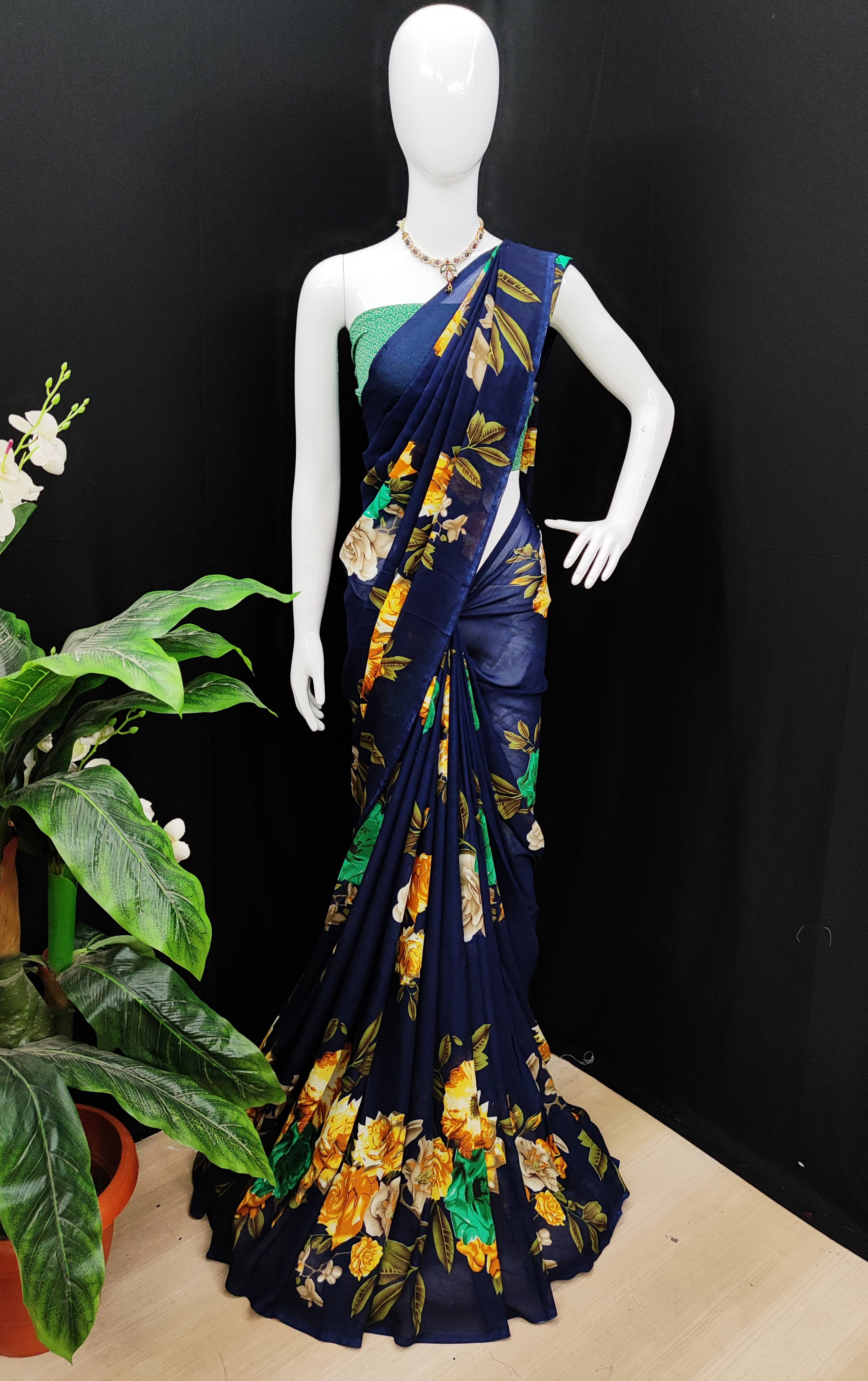 ANAND SAREES Georgette Printed Saree With Unstitched Blouse Piece ( Blue ) ANAND SAREES Georgette Printed Saree With Unstitched Blouse Piece ( Blue )