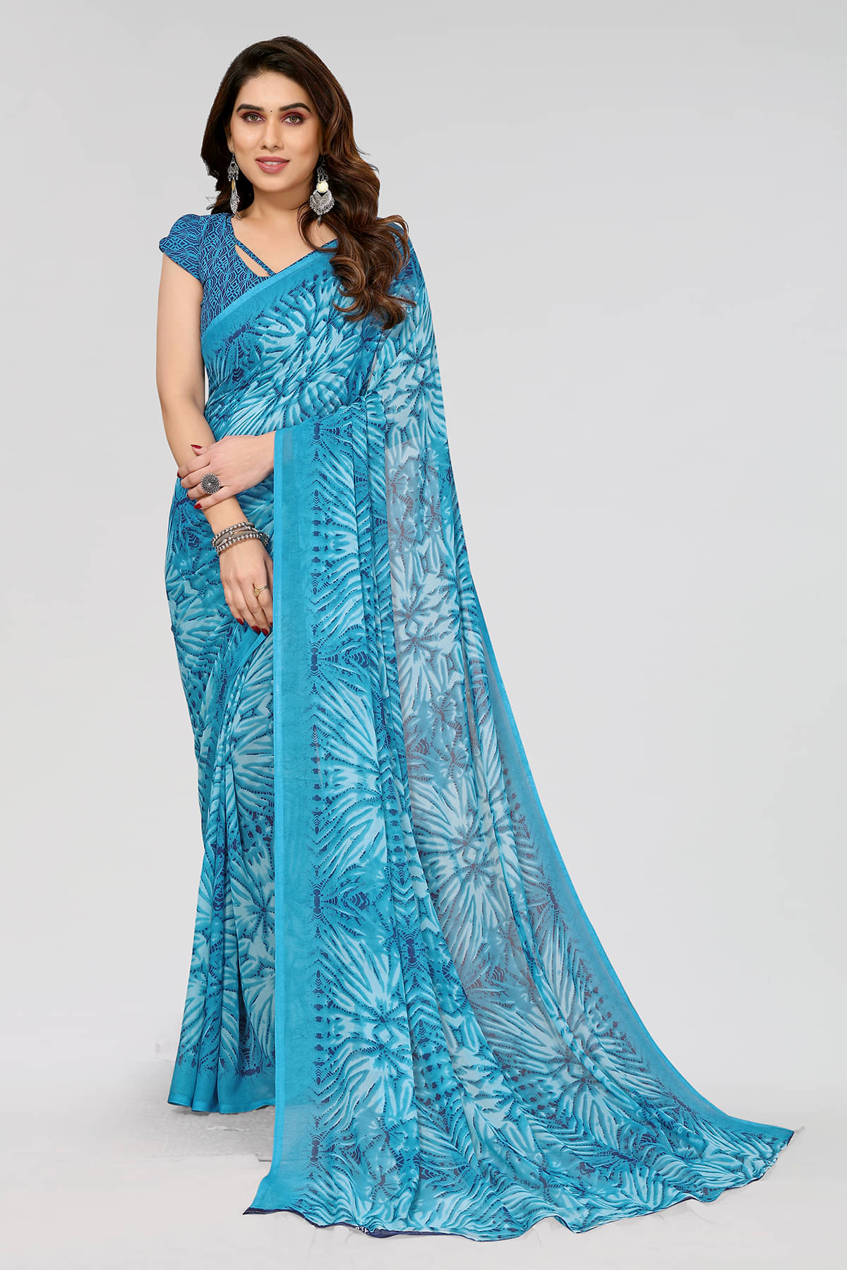 Anand Georgette Printed Saree With Unstitched Blouse Piece ( Blue ) Anand Georgette Printed Saree With Unstitched Blouse Piece ( Blue )