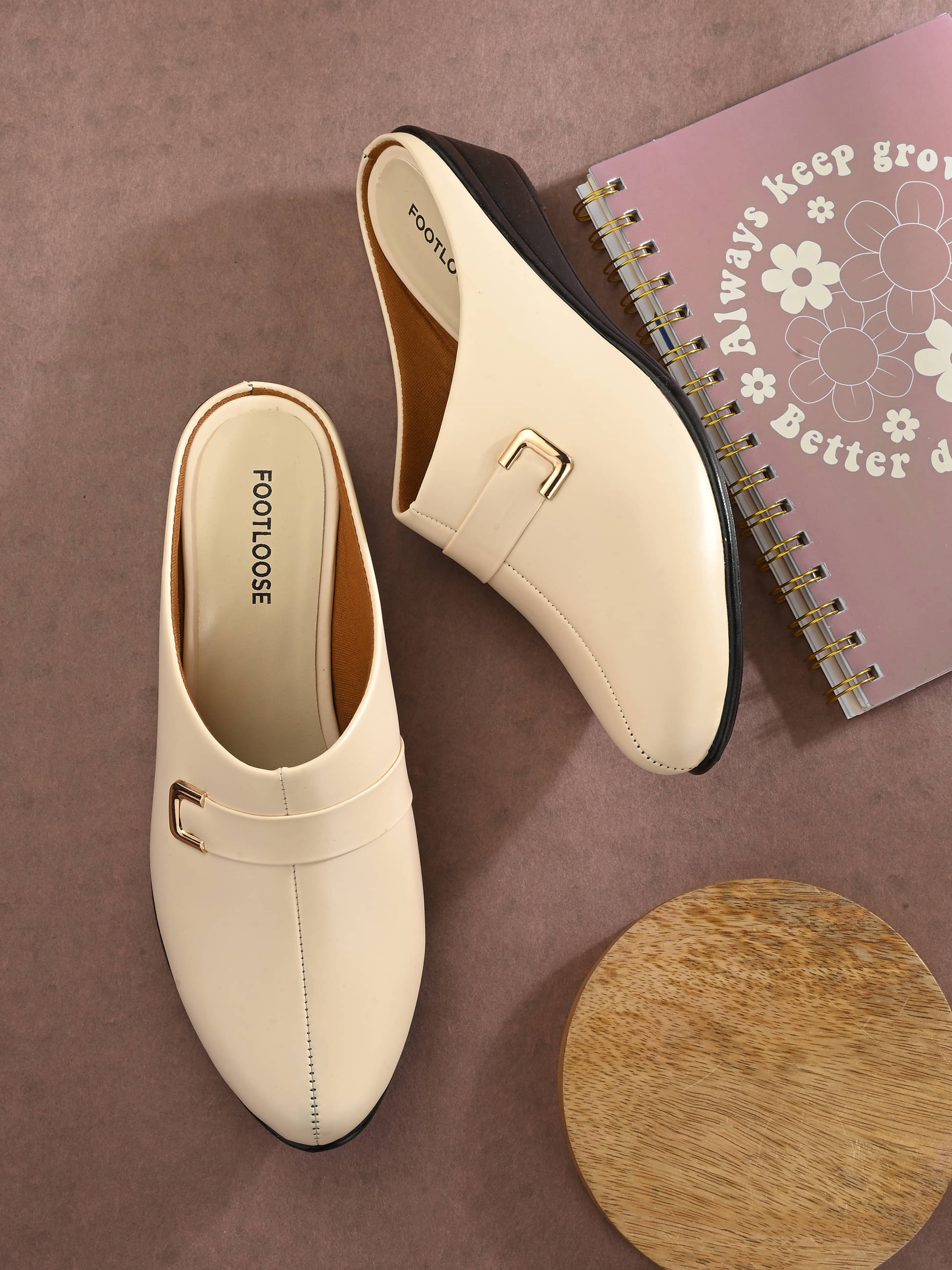    			Footloose Cream Women's Mules