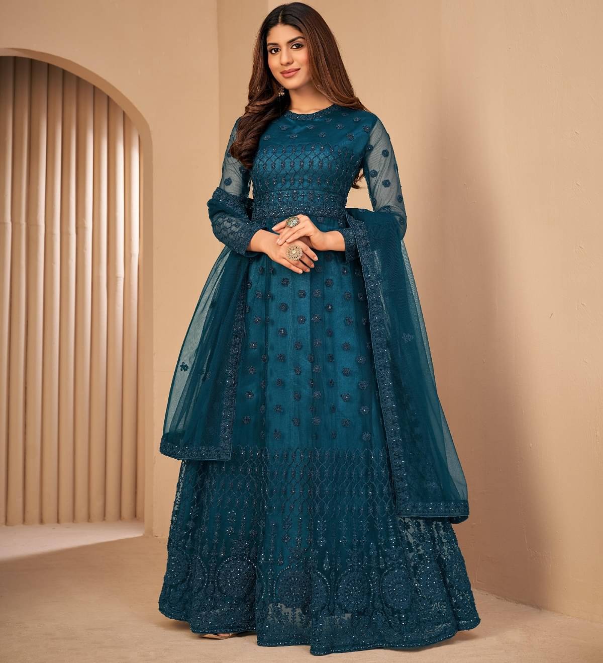 JULEE Teal Flared Net Women's Semi Stitched Ethnic Gown ( Pack of 1 ) JULEE Teal Flared Net Women's Semi Stitched Ethnic Gown ( Pack of 1 )