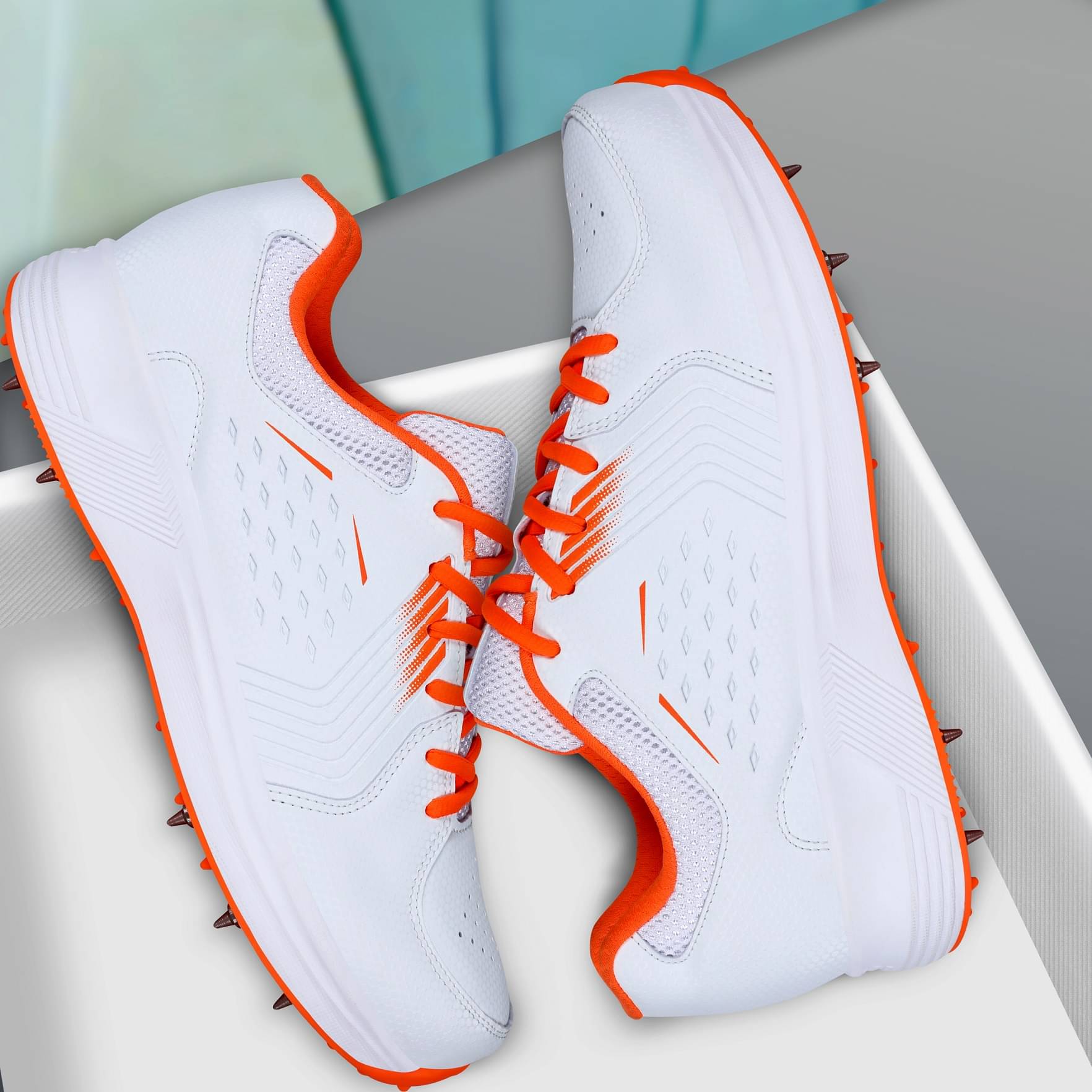     			Aivin King Orange Cricket Shoes