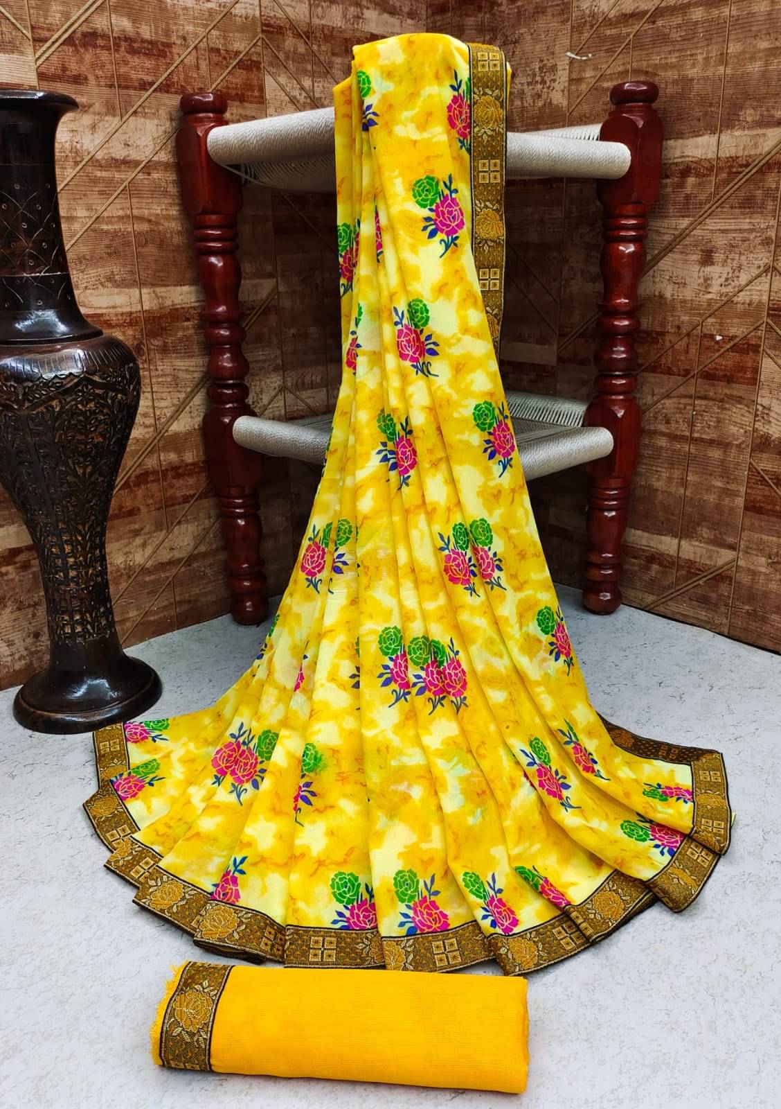 Kanooda Prints Georgette Printed Saree With Unstitched Blouse Piece ( Yellow ) Kanooda Prints Georgette Printed Saree With Unstitched Blouse Piece ( Yellow )