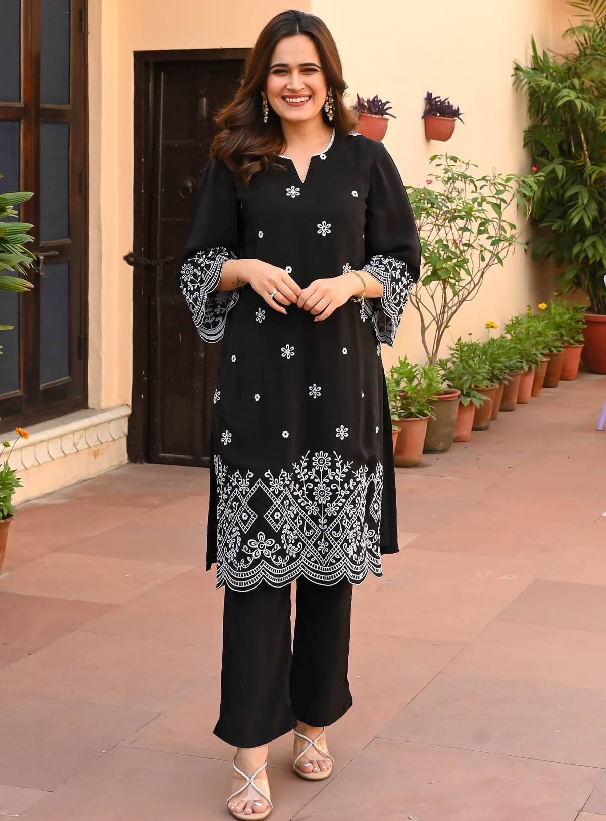     			Trijal Fab Rayon Embroidered Kurti With Pants Women's Stitched Salwar Suit - Black ( Pack of 1 )
