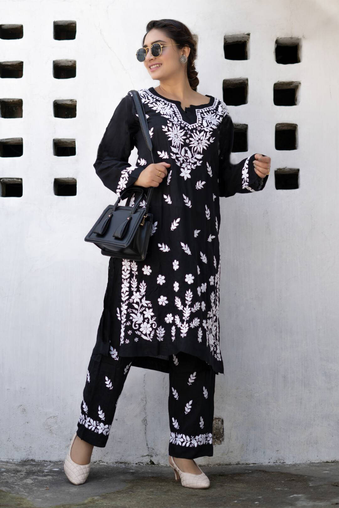     			Trijal Fab Rayon Embroidered Kurti With Pants Women's Stitched Salwar Suit - Black ( Pack of 1 )