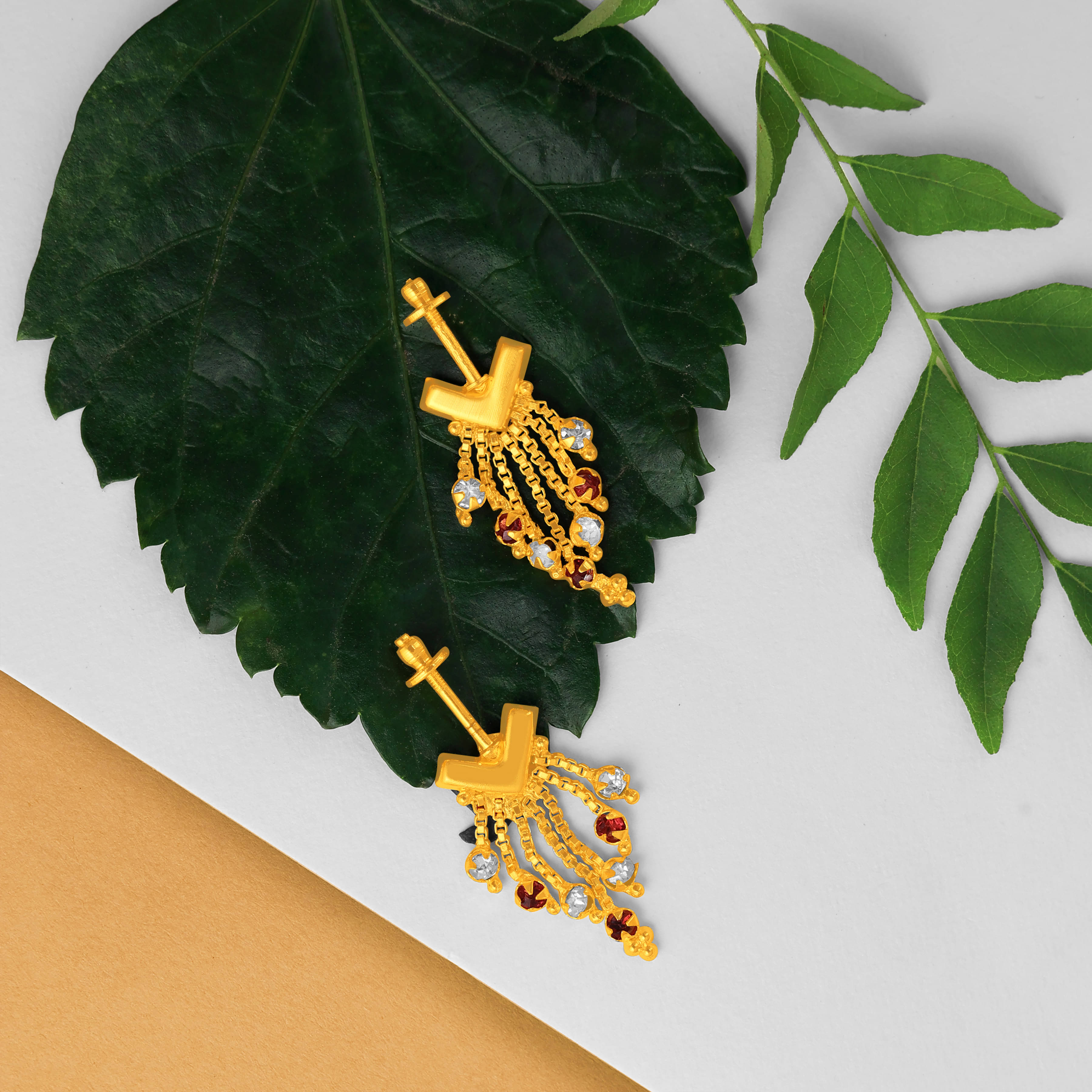     			LUV FASHION Golden Jhumki Earrings ( Pack of 1 )