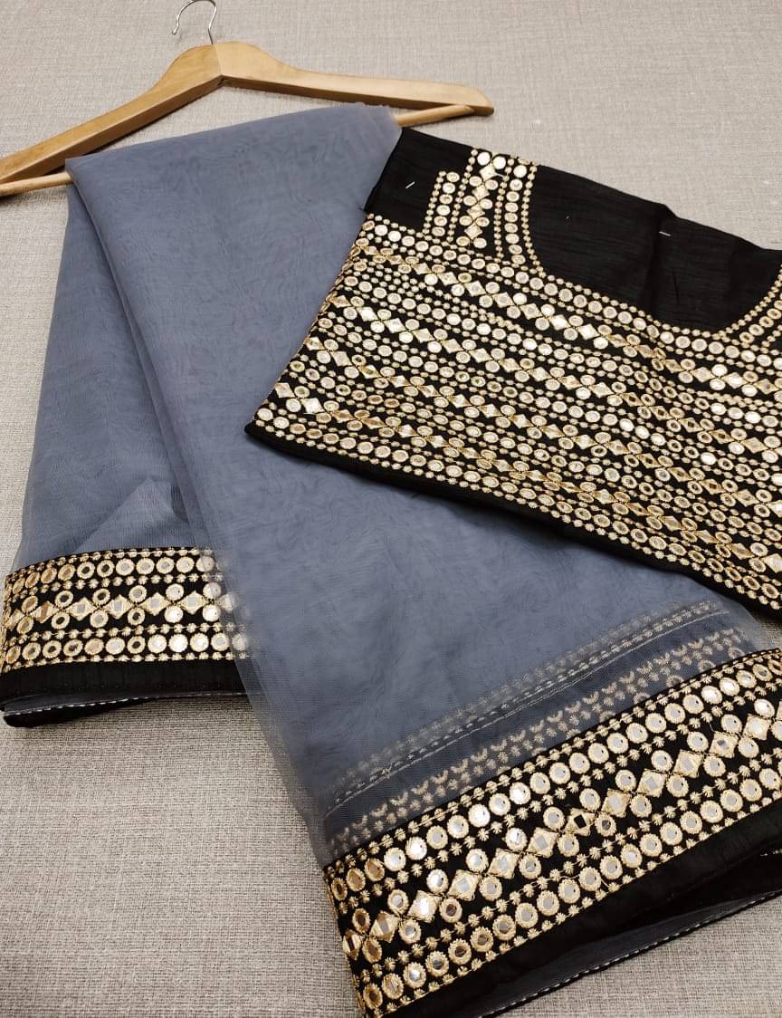 Poshvariety Net Printed Saree With Unstitched Blouse Piece ( Grey ) Poshvariety Net Printed Saree With Unstitched Blouse Piece ( Grey )