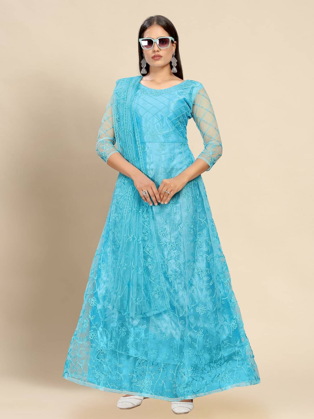 JULEE Turquoise Flared Net Women's Semi Stitched Ethnic Gown ( Pack of 1 )     			JULEE Turquoise Flared Net Women's Semi Stitched Ethnic Gown ( Pack of 1 )