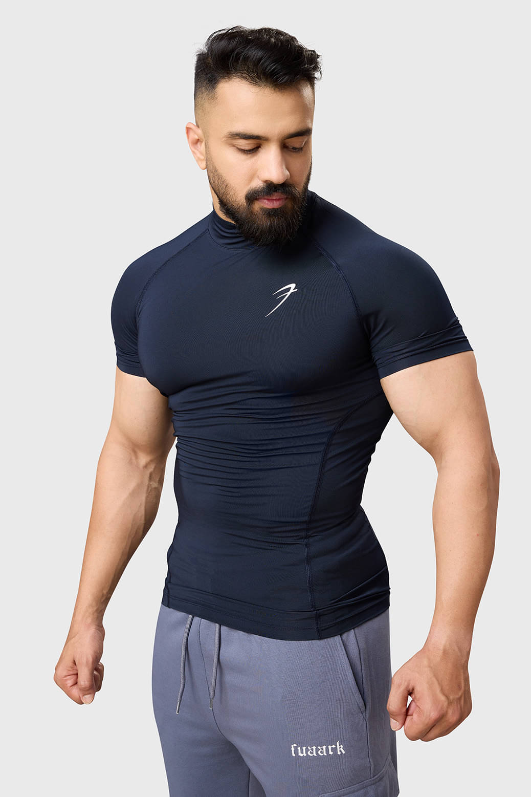 Fuaark Navy Polyester Slim Fit Men's Compression T-Shirt ( Pack of 1 )     			Fuaark Navy Polyester Slim Fit Men's Compression T-Shirt ( Pack of 1 )