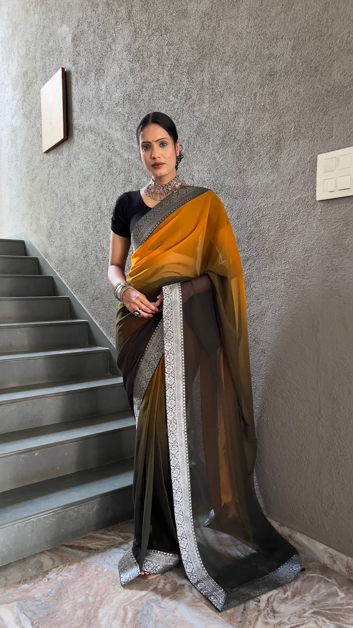 Apnisha Georgette Solid Saree With Unstitched Blouse Piece ( Grey )     			Apnisha Georgette Solid Saree With Unstitched Blouse Piece ( Grey )