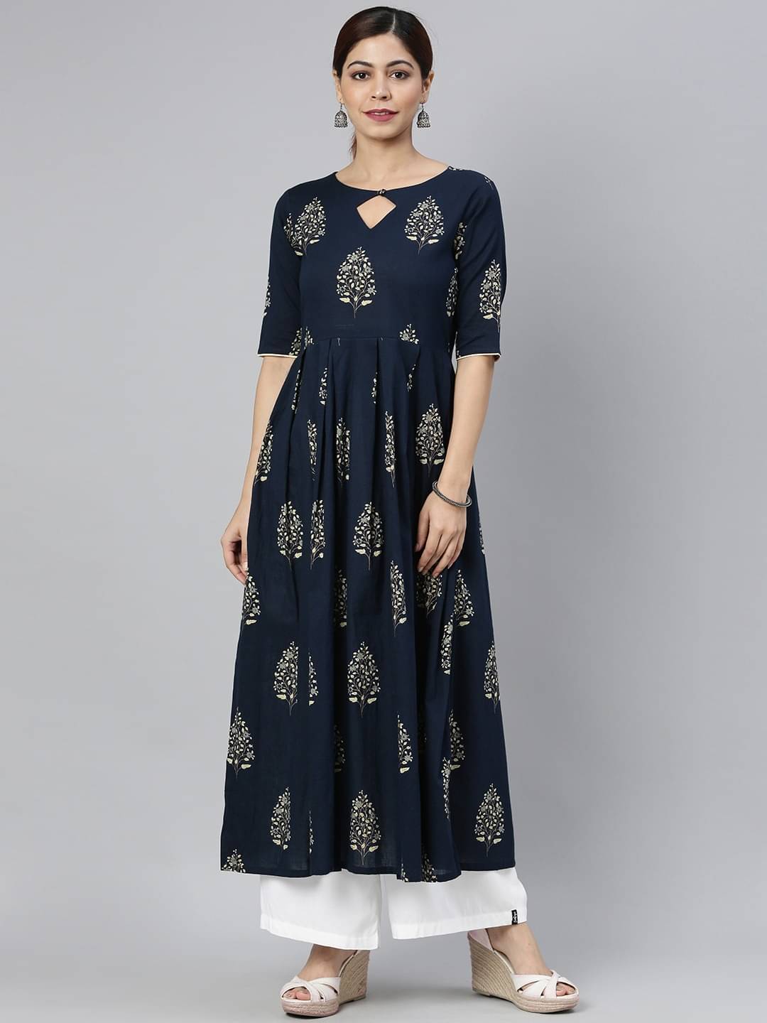 Vaamsi Cotton Printed A-line Women's Kurti - Navy Blue ( Pack of 1 )     			Vaamsi Cotton Printed A-line Women's Kurti - Navy Blue ( Pack of 1 )