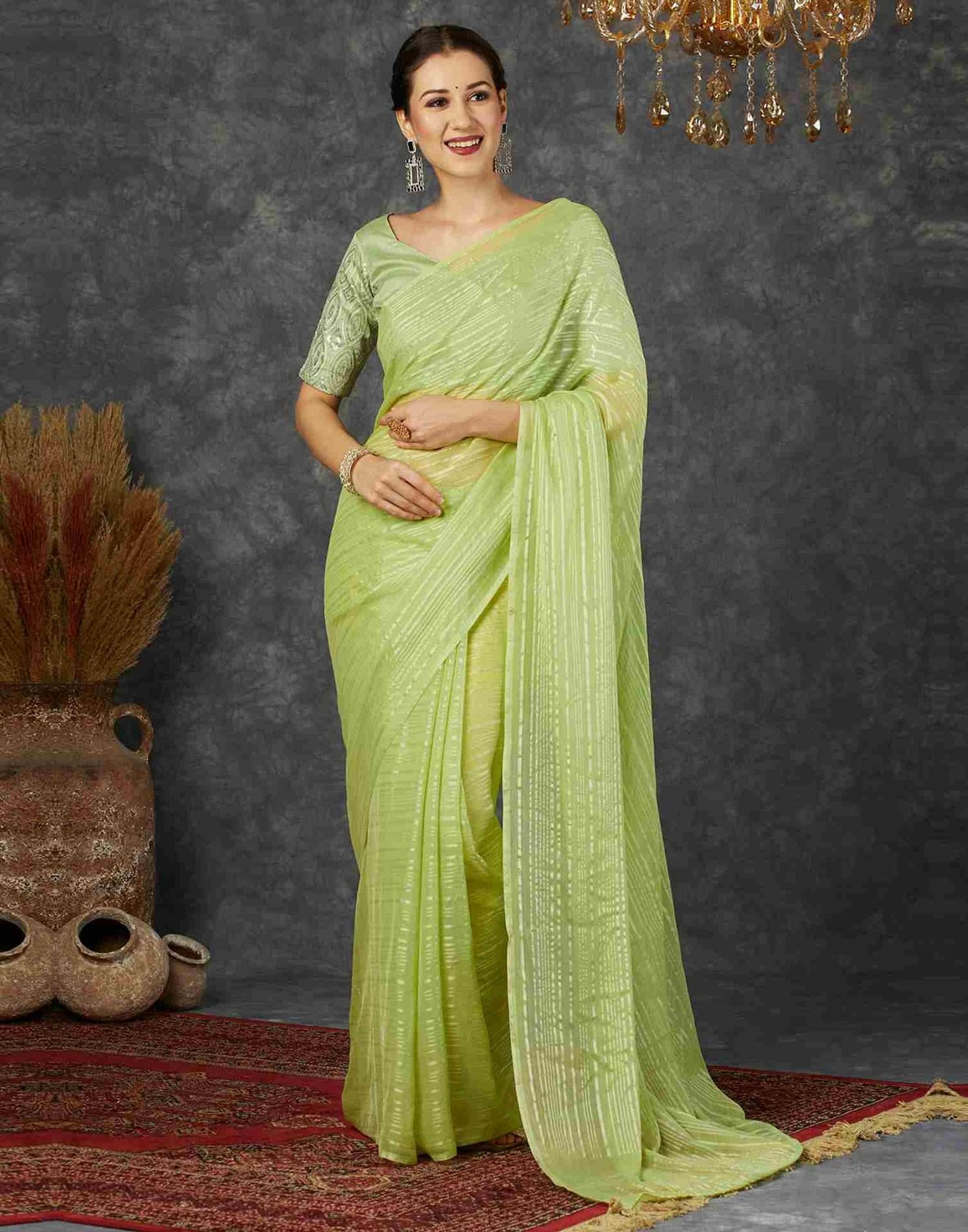 Nandini Creation Georgette Striped Saree With Unstitched Blouse Piece ( Light Green ) Nandini Creation Georgette Striped Saree With Unstitched Blouse Piece ( Light Green )