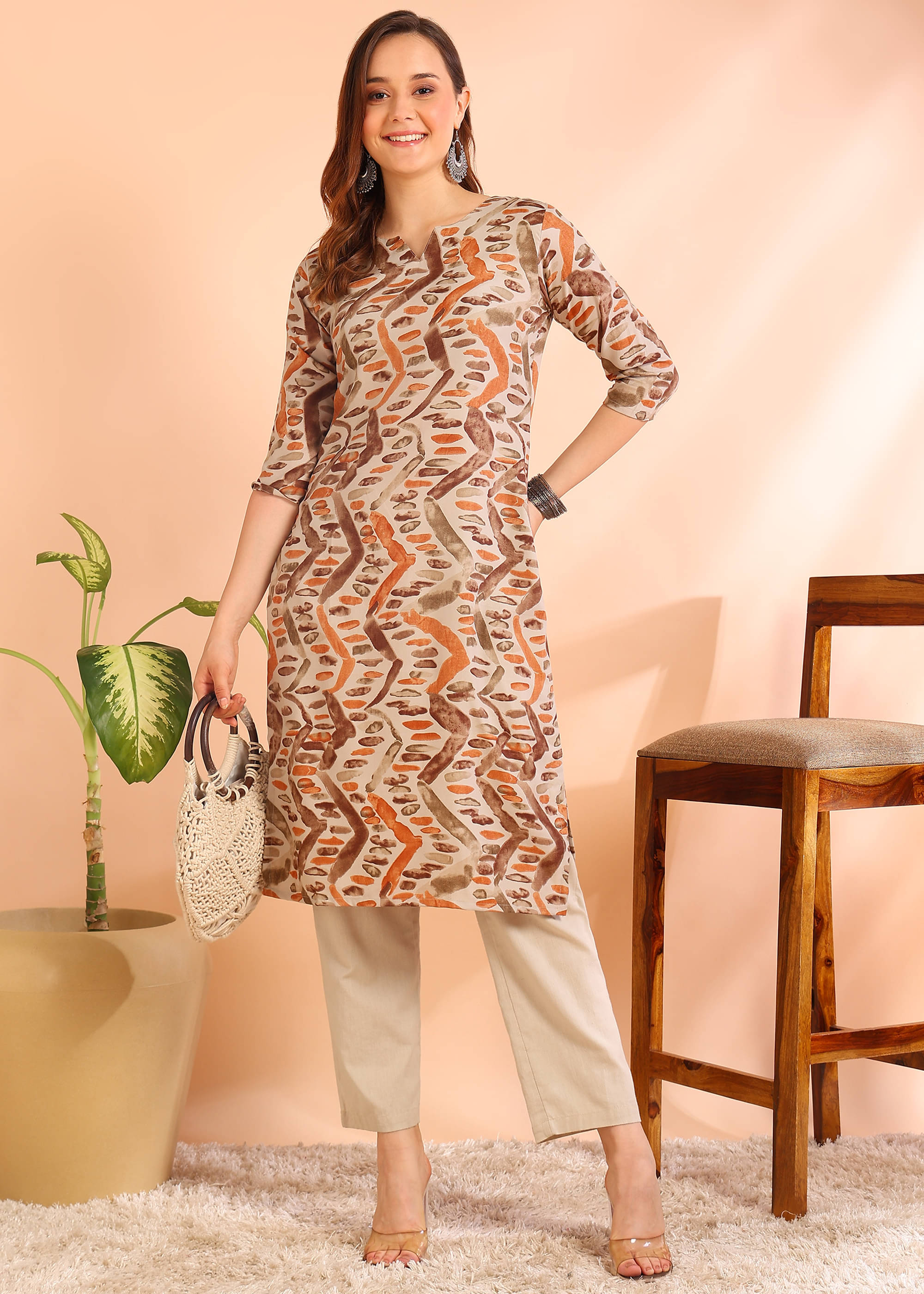 DSK STUDIO Pack of 1 Viscose Printed Straight Women's Kurti - ( Brown ) DSK STUDIO Pack of 1 Viscose Printed Straight Women's Kurti - ( Brown )