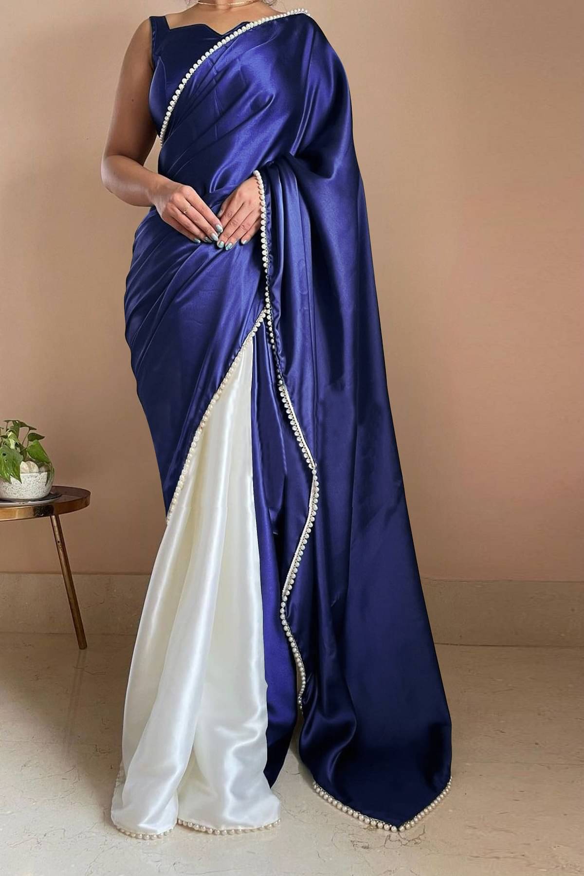 Apnisha Satin Embellished Saree With Unstitched Blouse Piece ( Navy Blue ) Apnisha Satin Embellished Saree With Unstitched Blouse Piece ( Navy Blue )