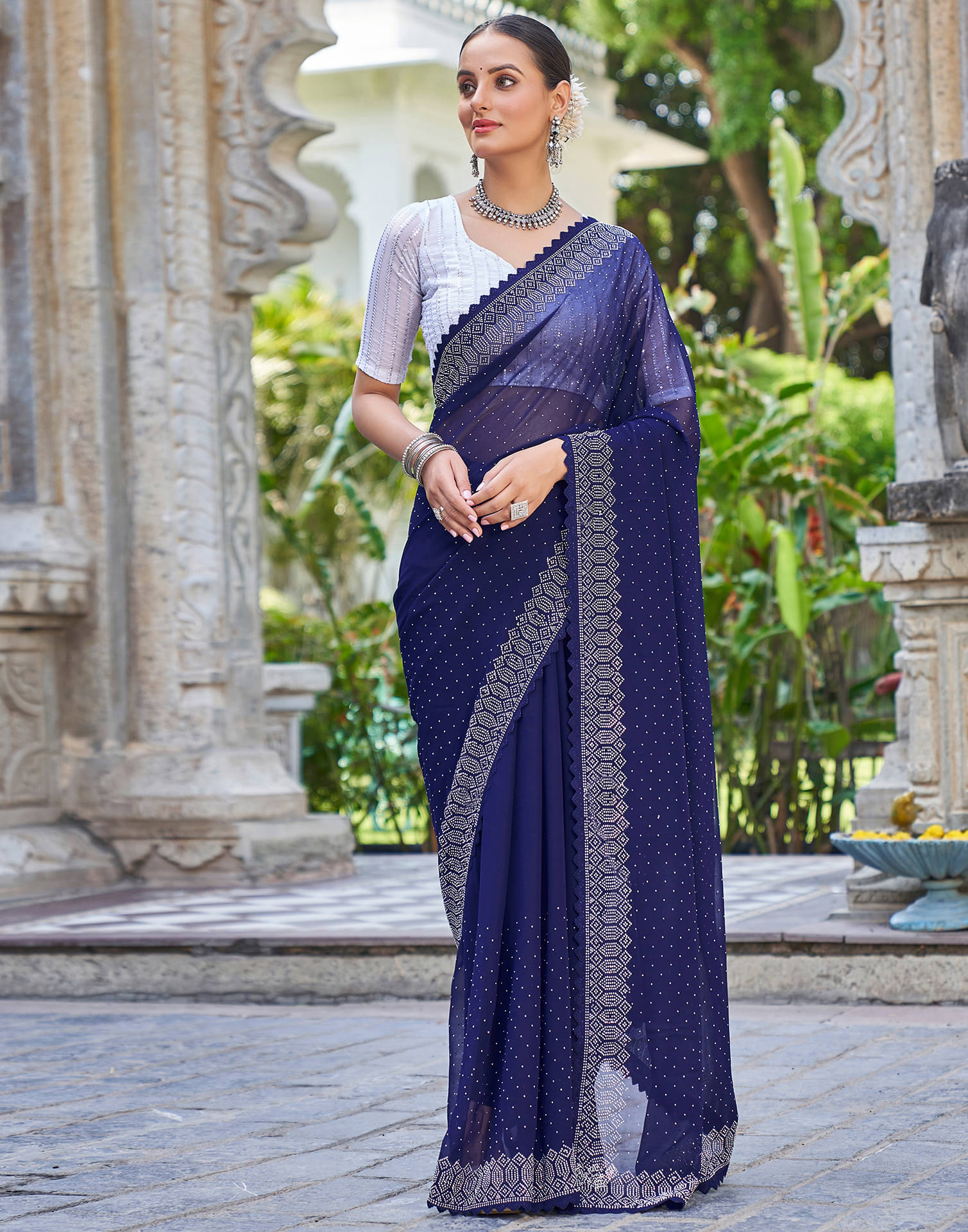 Satrani Georgette Embellished Saree With Unstitched Blouse Piece ( Navy Blue ) Satrani Georgette Embellished Saree With Unstitched Blouse Piece ( Navy Blue )