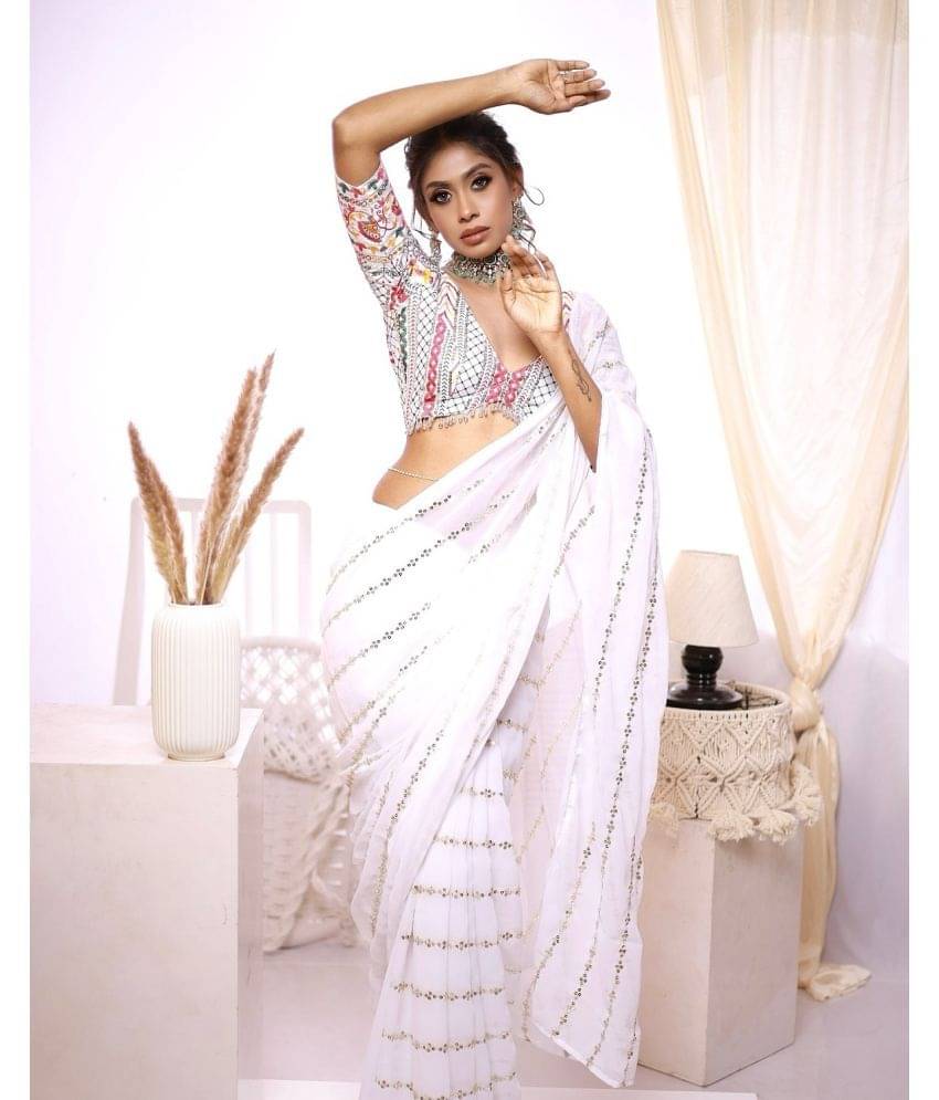     			Apnisha Georgette Embroidered Saree With Unstitched Blouse Piece ( Multicolor )