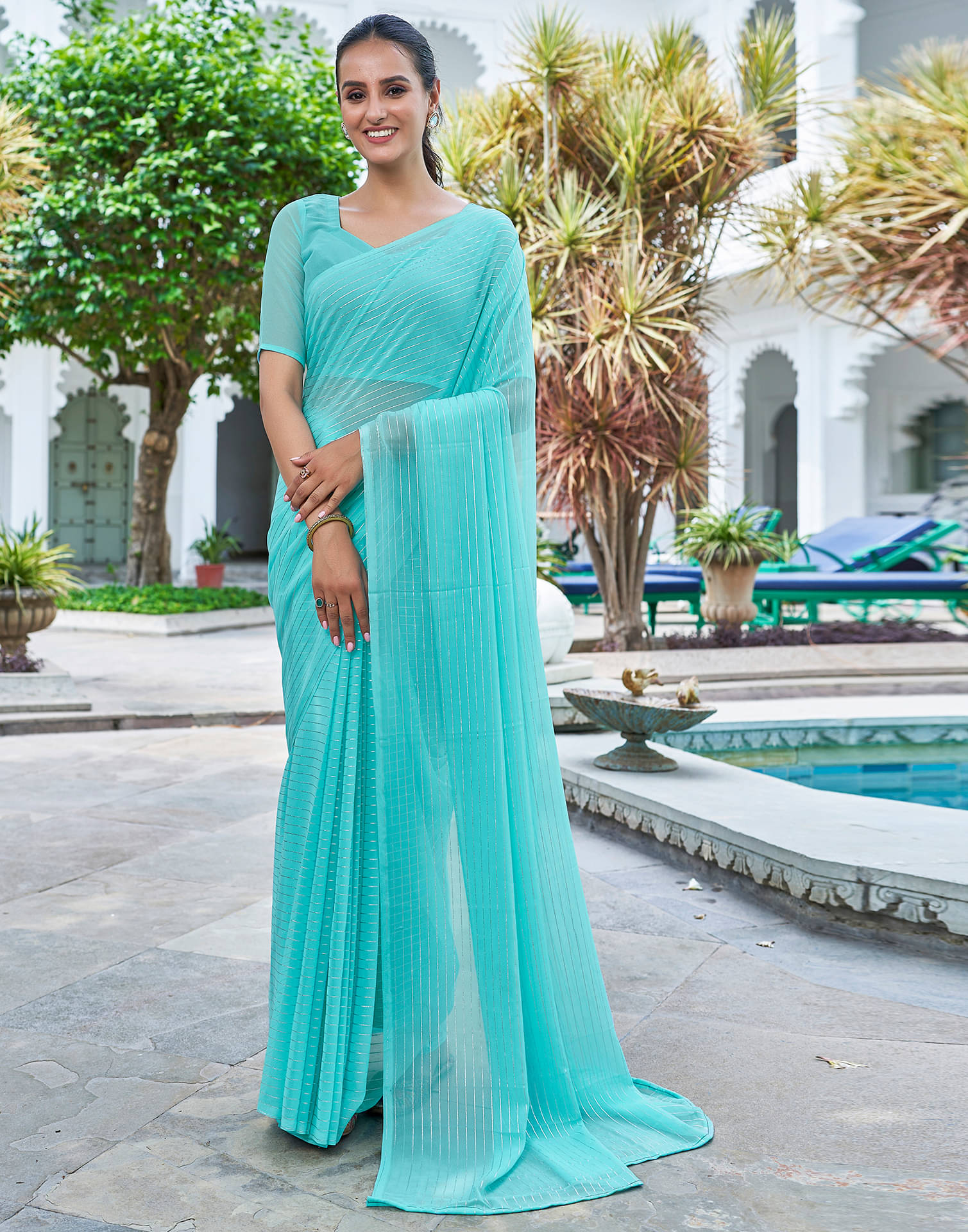     			Satrani Georgette Solid Saree With Unstitched Blouse Piece ( LightBLue )