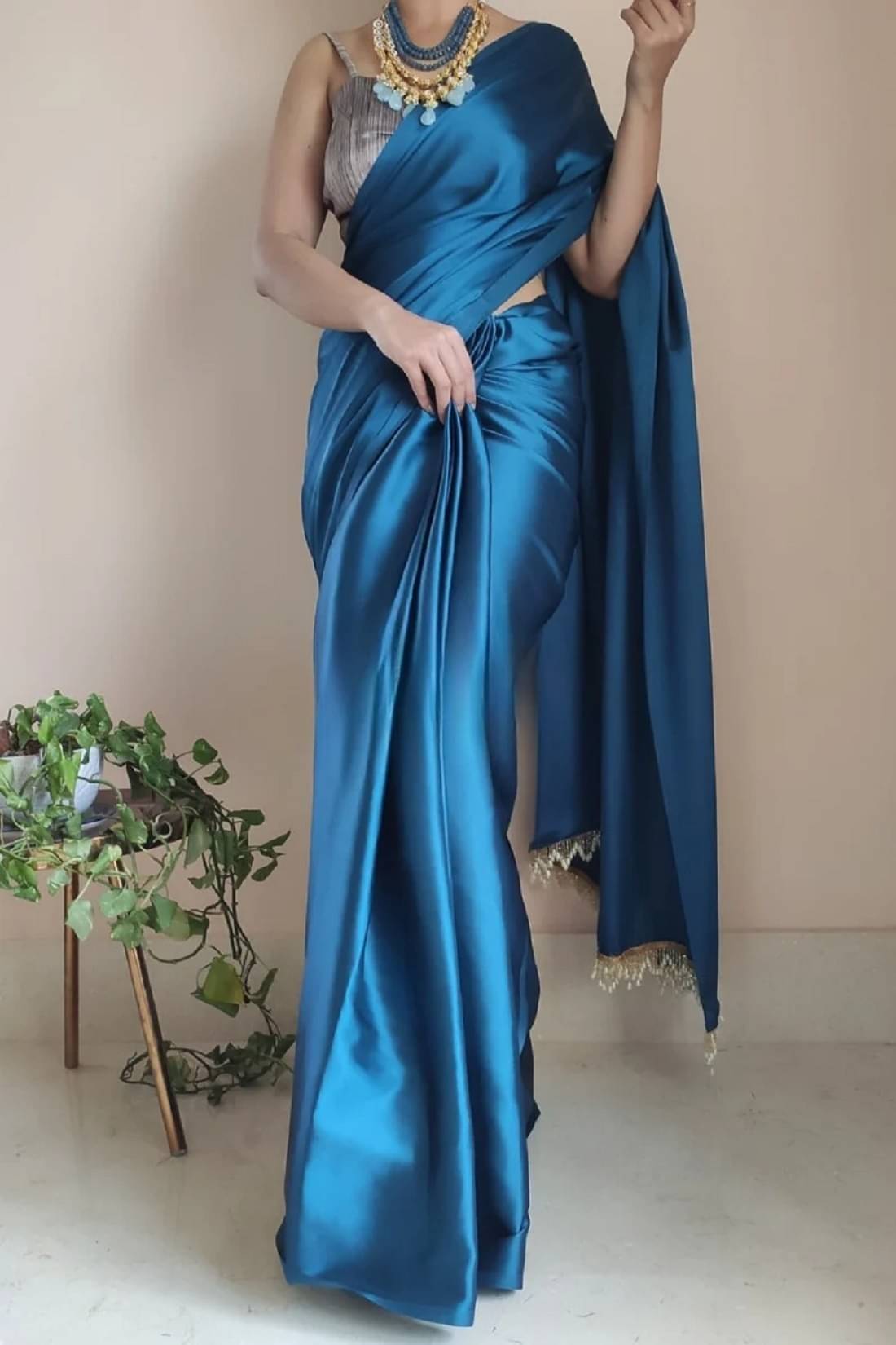 Apnisha Satin Solid Saree With Unstitched Blouse Piece ( Teal ) Apnisha Satin Solid Saree With Unstitched Blouse Piece ( Teal )