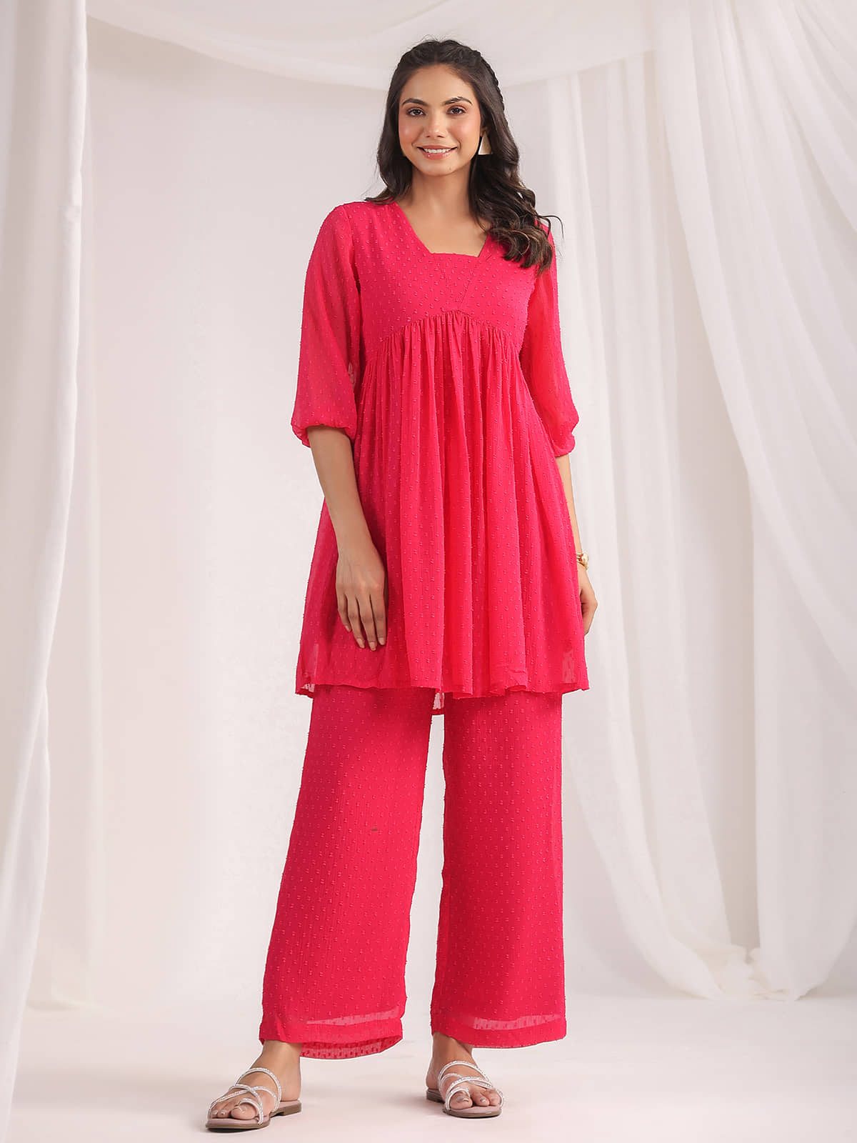 Janasya Women Georgette Self Design Flared Kurti With Pants ( Pink )