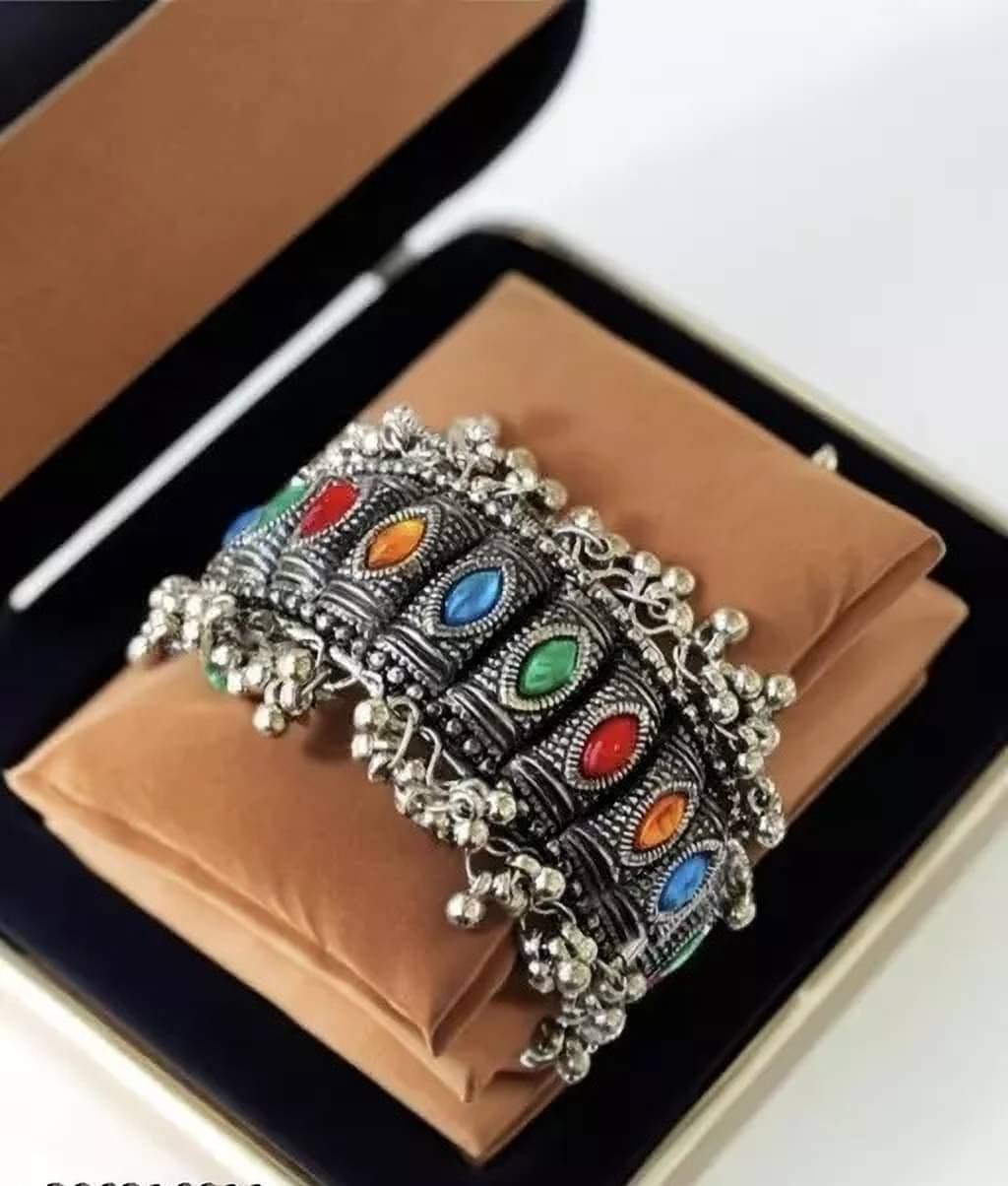Samridhi DC Silver Bangle ( Pack of 1 ) Samridhi DC Silver Bangle ( Pack of 1 )