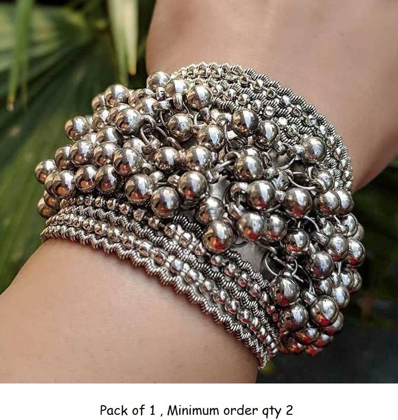     			Samridhi DC Silver Bangle ( Pack of 1 )