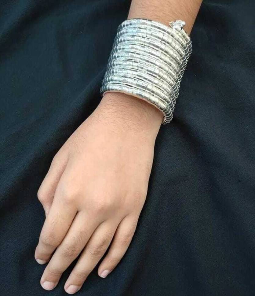     			Samridhi DC Silver Bangle ( Pack of 1 )