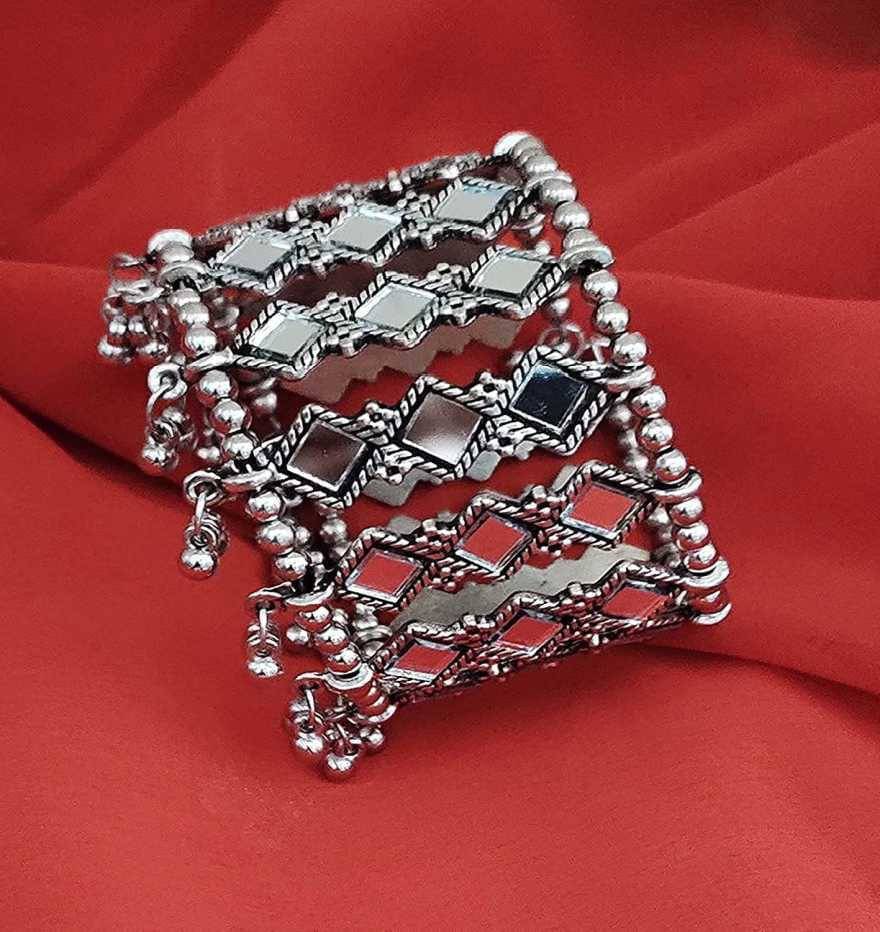 Samridhi DC Silver Bangle ( Pack of 1 ) Samridhi DC Silver Bangle ( Pack of 1 )