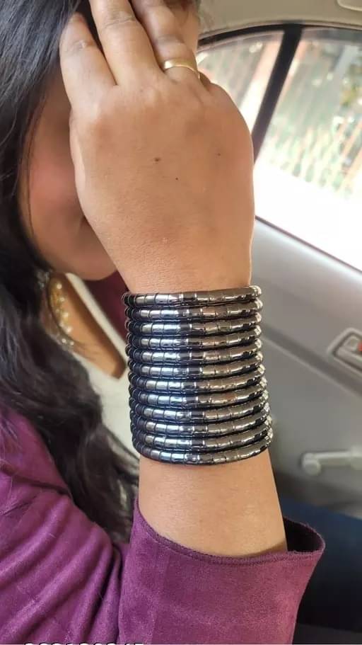 Samridhi DC Silver Bangle ( Pack of 1 ) Samridhi DC Silver Bangle ( Pack of 1 )
