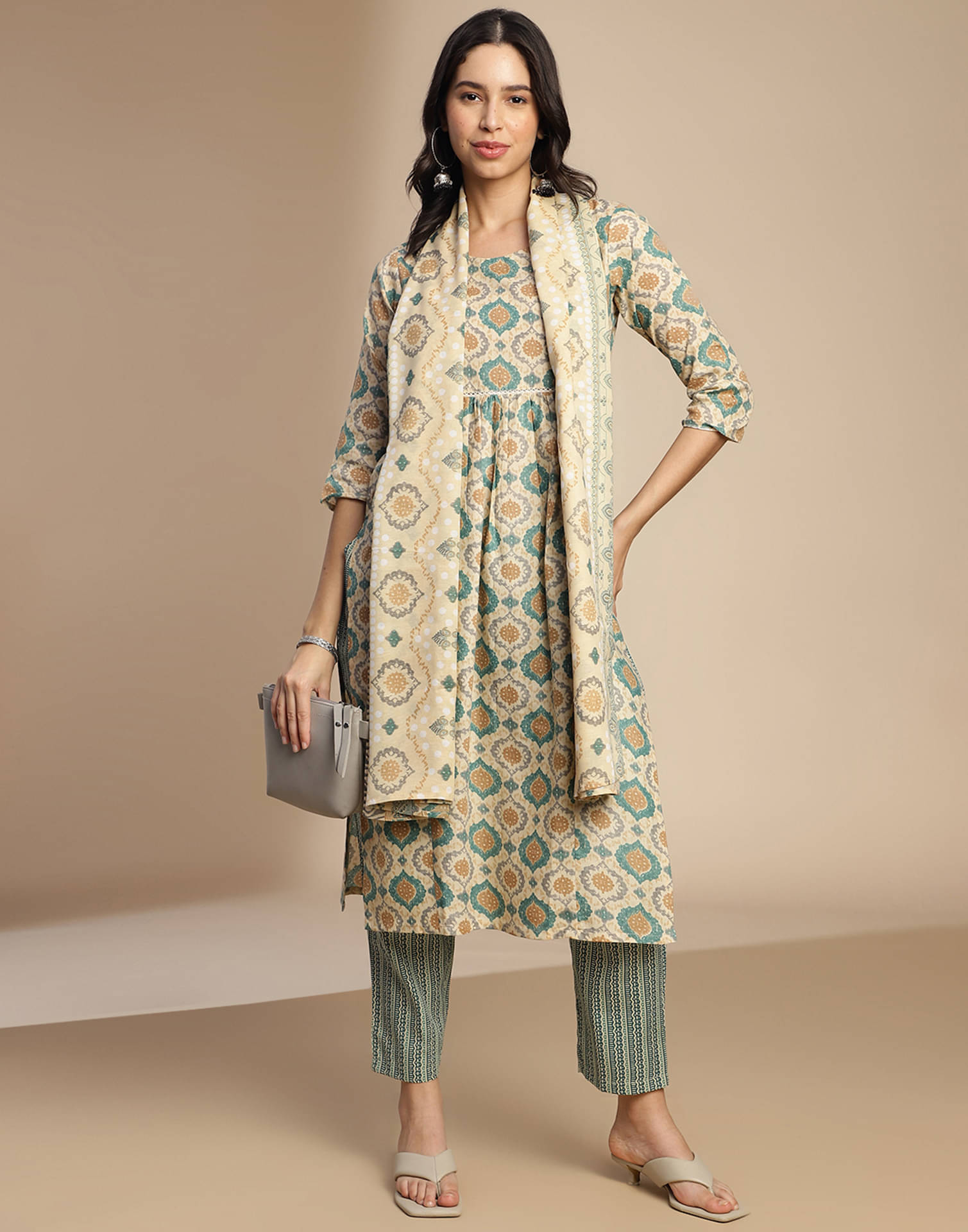 Skylee Cotton Printed Kurti With Pants Women's Stitched Salwar Suit - Beige ( Pack of 1 ) Skylee Cotton Printed Kurti With Pants Women's Stitched Salwar Suit - Beige ( Pack of 1 )