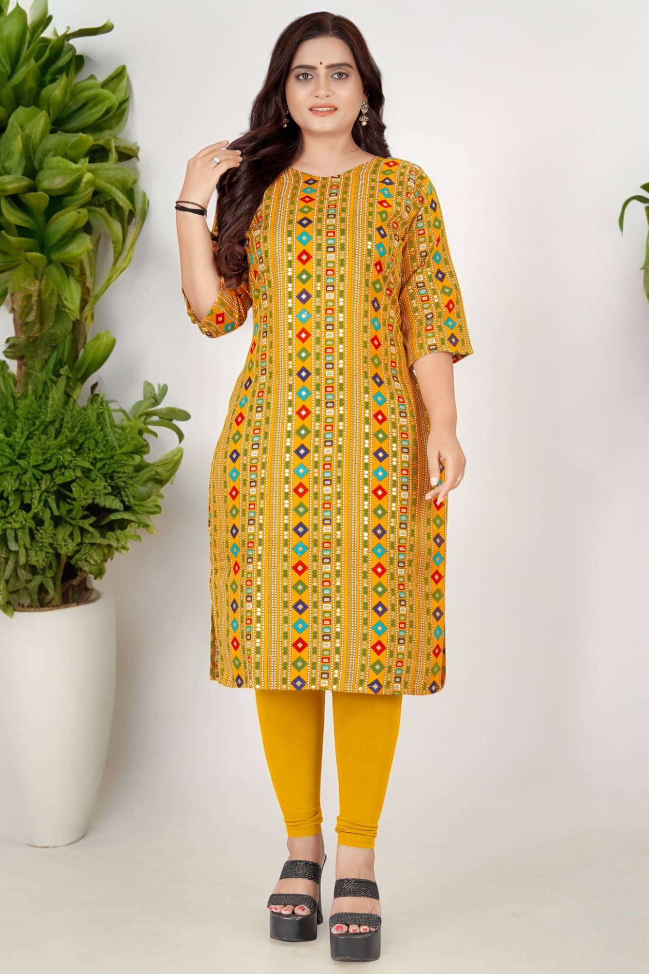     			AMTHI Cotton Blend Printed Straight Women's Kurti - Yellow ( Pack of 1 )