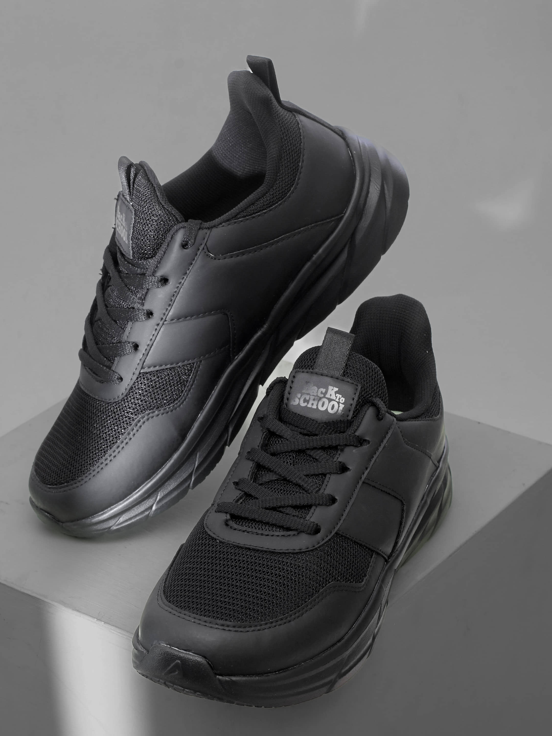 nike revolution 2 black school shoes