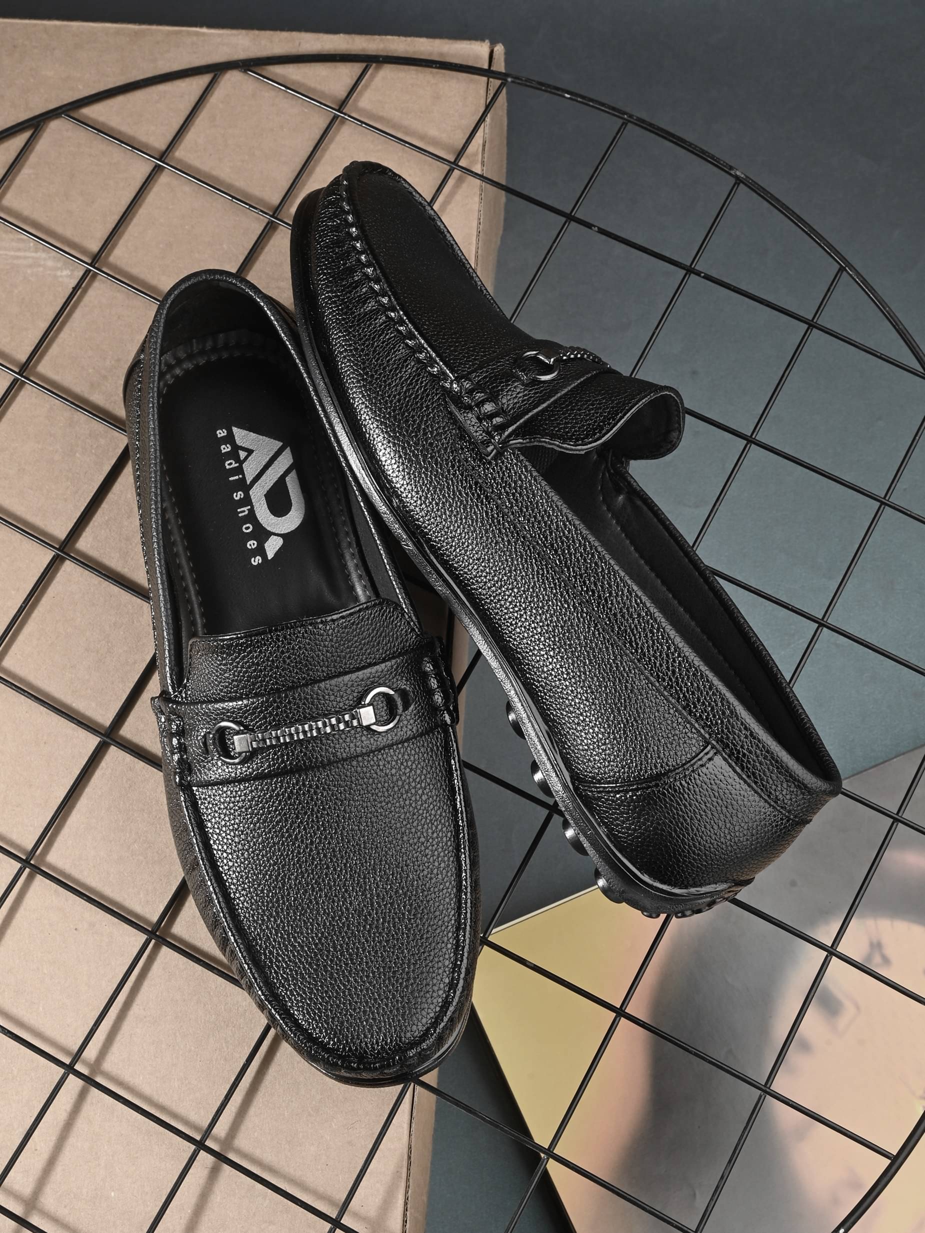     			Aadi Black Men's Slip on