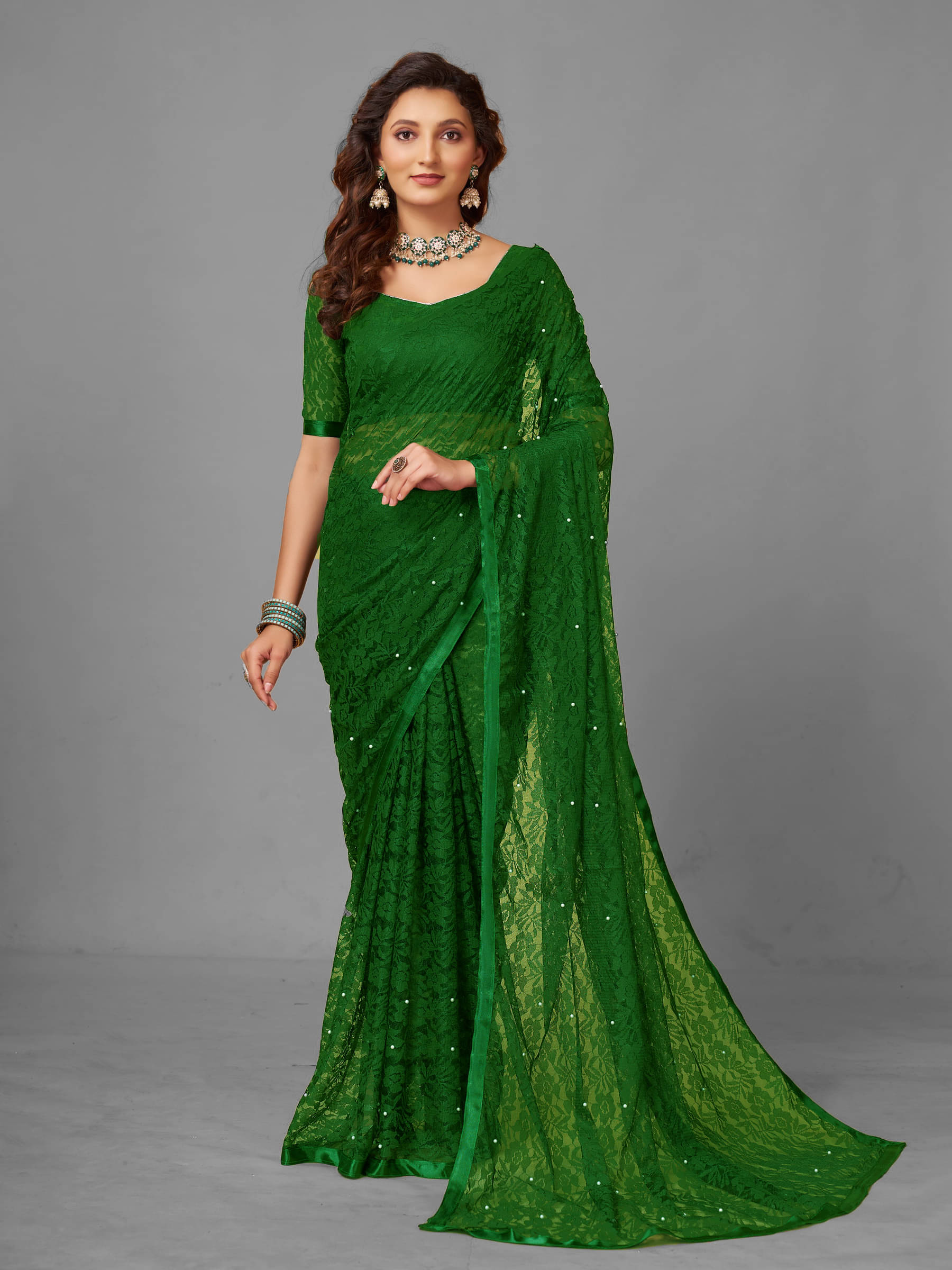VANRAJ CREATION Brasso Self Design Saree With Unstitched Blouse Piece ( Green ) VANRAJ CREATION Brasso Self Design Saree With Unstitched Blouse Piece ( Green )