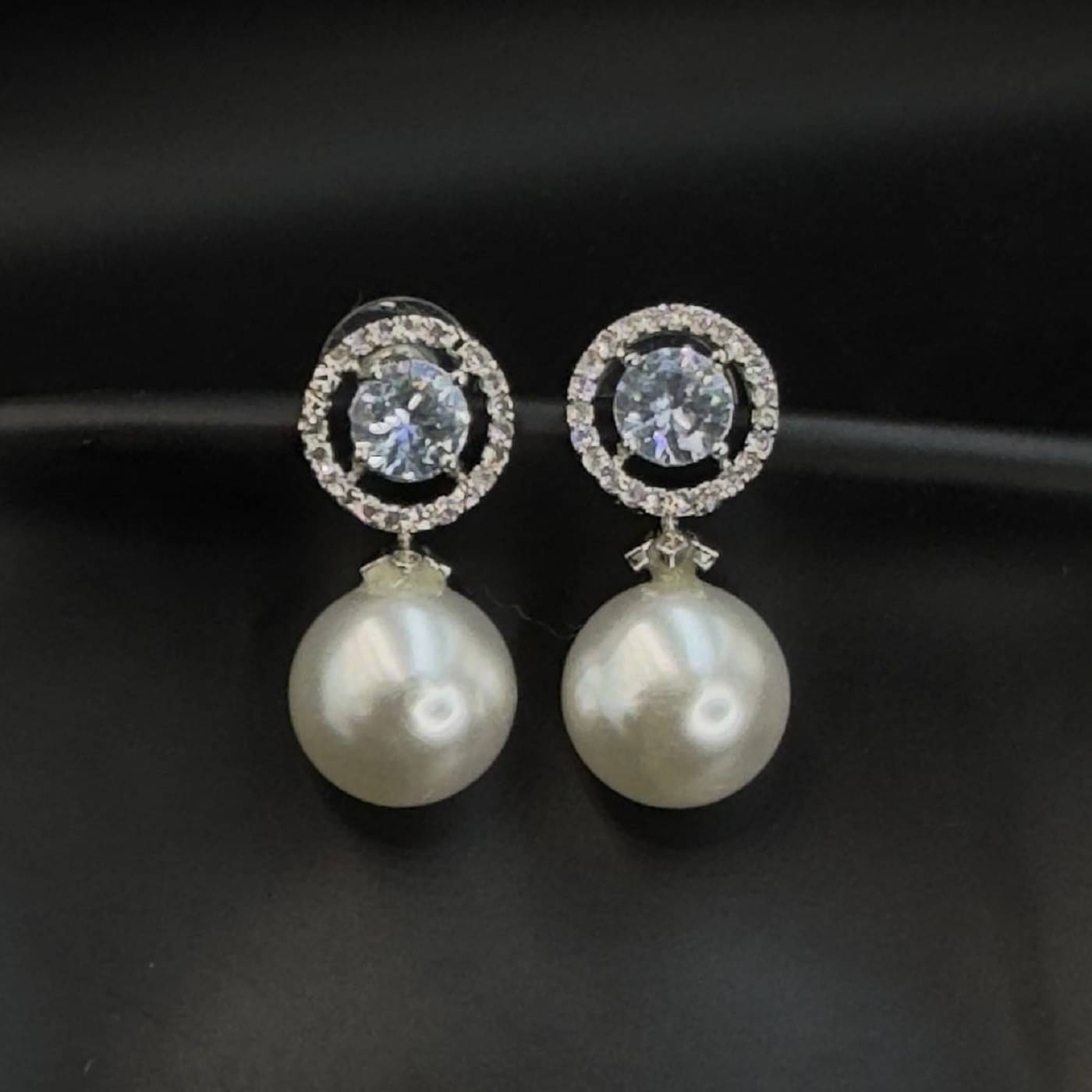     			AKLINA White Danglers Earrings ( Pack of 1 )