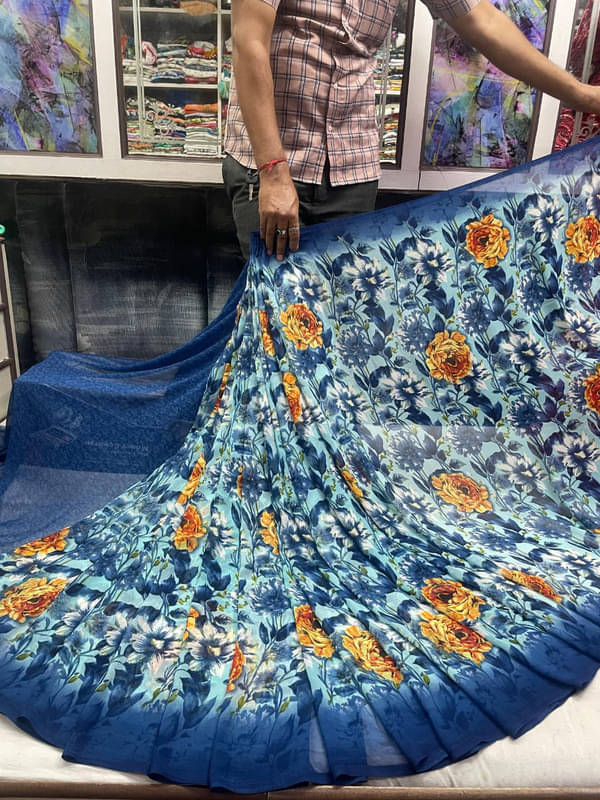 Sanjana Silks Georgette Printed Saree With Unstitched Blouse Piece ( Blue ) Sanjana Silks Georgette Printed Saree With Unstitched Blouse Piece ( Blue )
