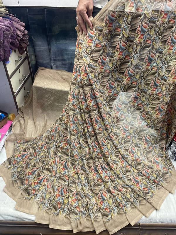     			Sanjana Silks Georgette Printed Saree With Unstitched Blouse Piece ( Brown )