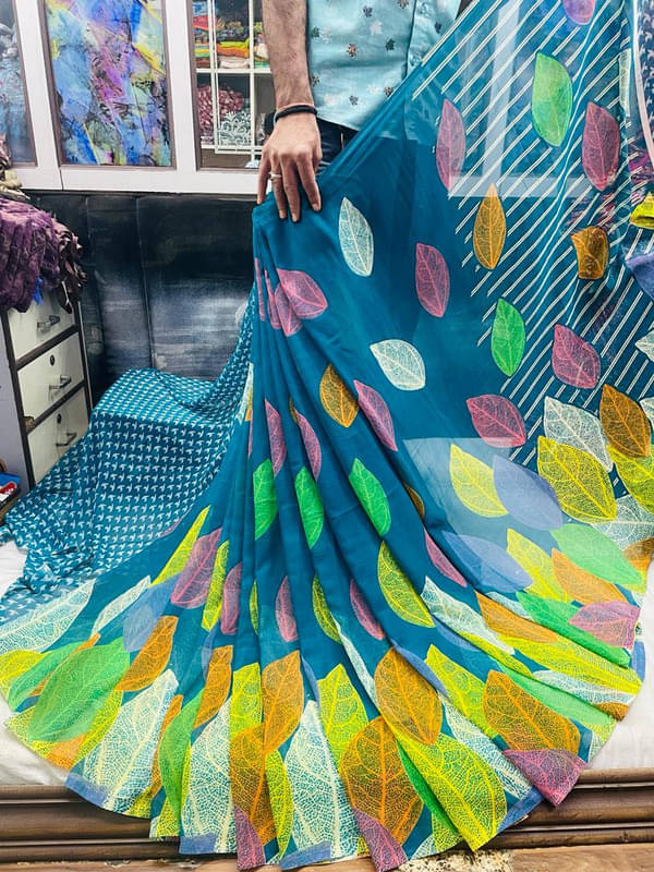 Sanjana Silks Georgette Printed Saree With Unstitched Blouse Piece ( SkyBlue ) Sanjana Silks Georgette Printed Saree With Unstitched Blouse Piece ( SkyBlue )