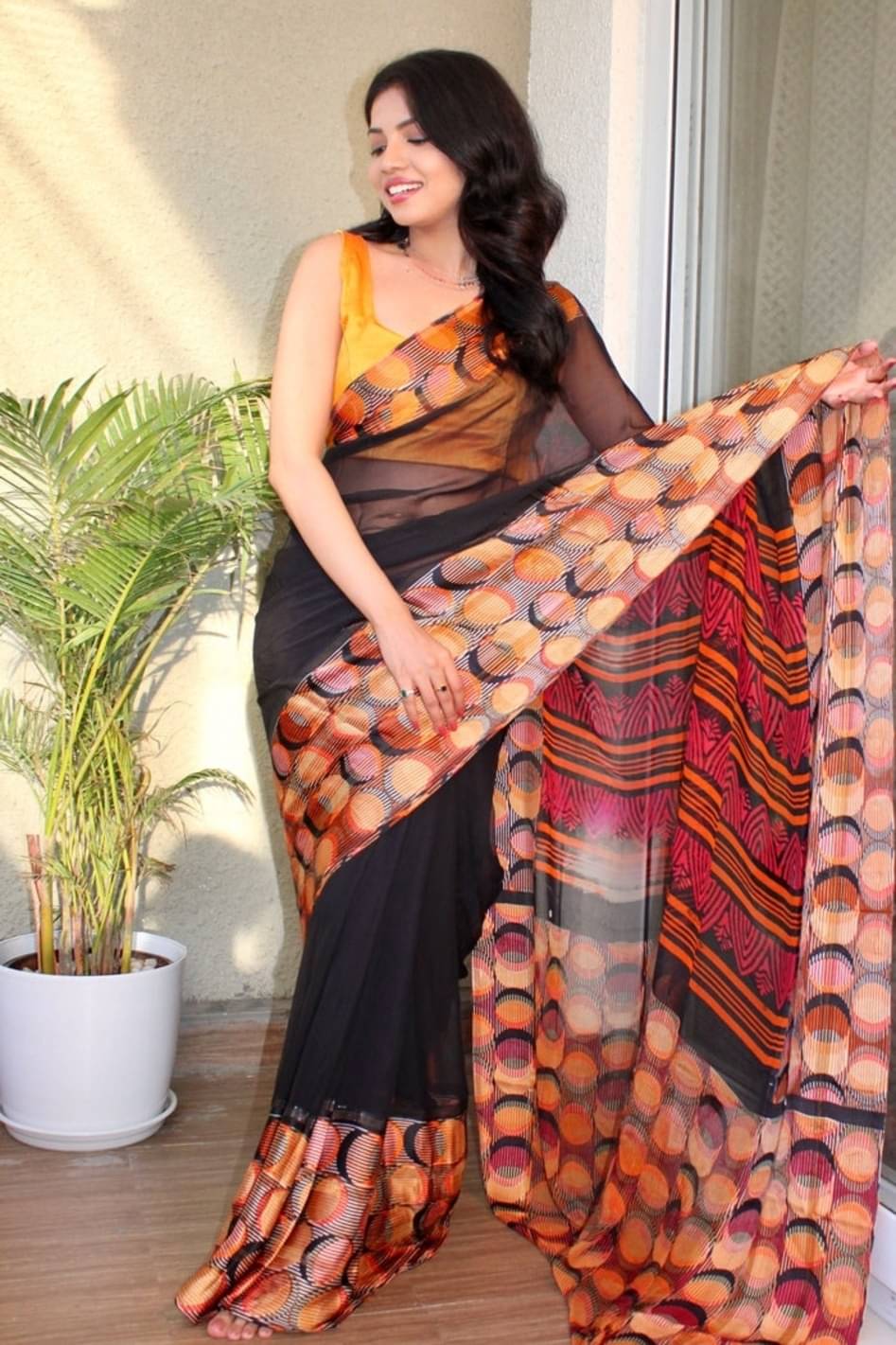 Sanwariya Silks Georgette Printed Saree With Unstitched Blouse Piece ( Black ) Sanwariya Silks Georgette Printed Saree With Unstitched Blouse Piece ( Black )