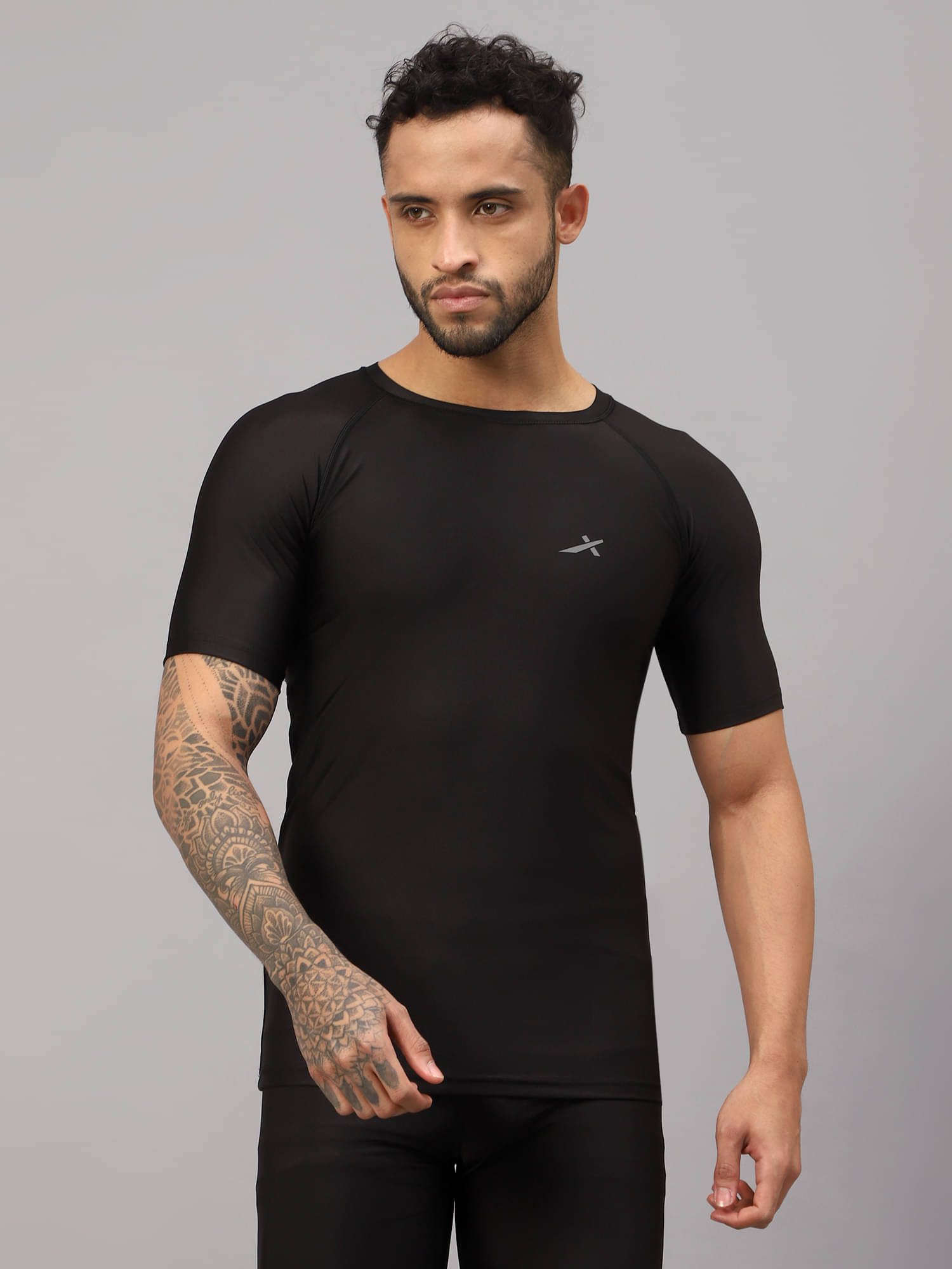 Vector X Black Polyester Slim Fit Men's Compression T-Shirt ( Pack of 1 )     			Vector X Black Polyester Slim Fit Men's Compression T-Shirt ( Pack of 1 )