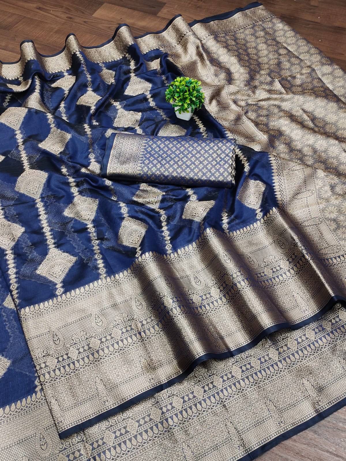 Kalpana Creation Organza Woven Saree With Unstitched Blouse Piece ( Navy Blue )     			Kalpana Creation Organza Woven Saree With Unstitched Blouse Piece ( Navy Blue )