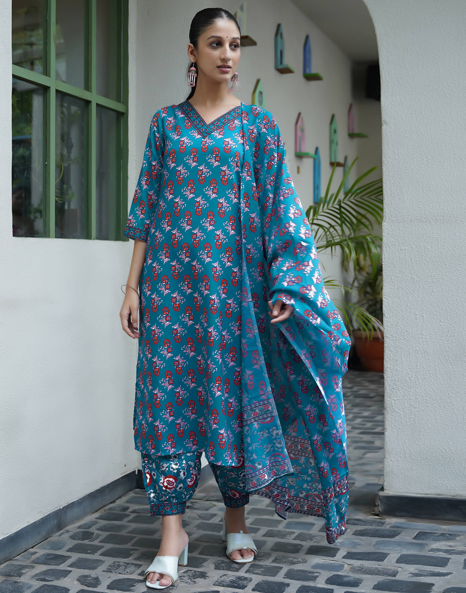 Skylee Rayon Printed Kurti With Salwar Women's Stitched Salwar Suit - Teal ( Pack of 1 )     			Skylee Rayon Printed Kurti With Salwar Women's Stitched Salwar Suit - Teal ( Pack of 1 )